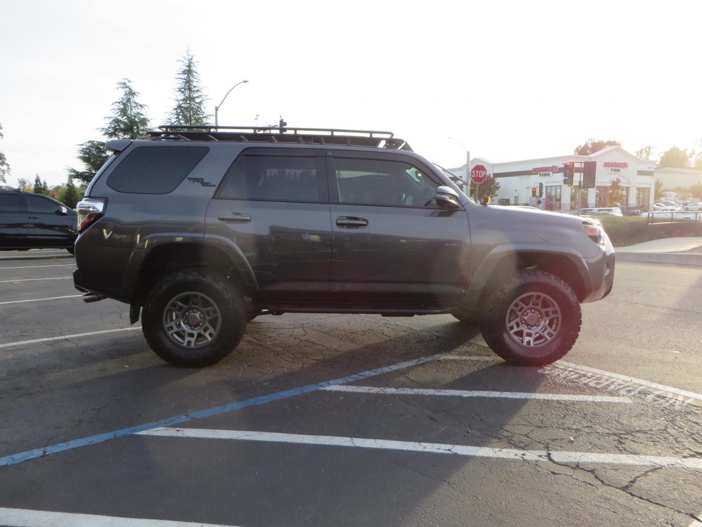 2019 CHARCOAL /BLACK Toyota 4Runner TRD Off-Road Premium 4WD (JTEBU5JR8K5) with an 4.0L V6 DOHC 24V engine, 5A transmission, located at 2630 Grass Valley Highway, Auburn, CA, 95603, (530) 508-5100, 38.937893, -121.095482 - Looking for a 4Runner to start your overlanding adventures? Check out this TRD Off-Road Premium Featuring Dobinson suspension, TRD wheels, Toyo AT tires, Gobi Roof Rack and ladder, Rock Sliders, Baja Designs A pillar lights, C4 Skid Plate, Bug Guards, AVS window vetn visors, ICS dash mount, CB, Spri - Photo#3