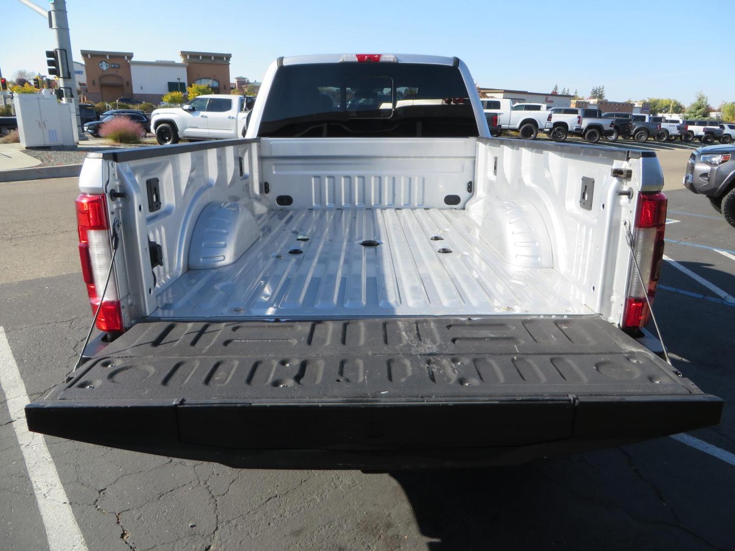 2019 SILVER /black Ford F-350 SD Platinum Crew Cab 4WD Long Bed (1FT8W3BT7KE) with an 6.7L V8 OHV 16V DIESEL engine, 6A transmission, located at 2630 Grass Valley Highway, Auburn, CA, 95603, (530) 508-5100, 38.937893, -121.095482 - Lond Bed Superduty with factory 5th wheel prep ready to tow and Rigid industries back up lights. - Photo#10