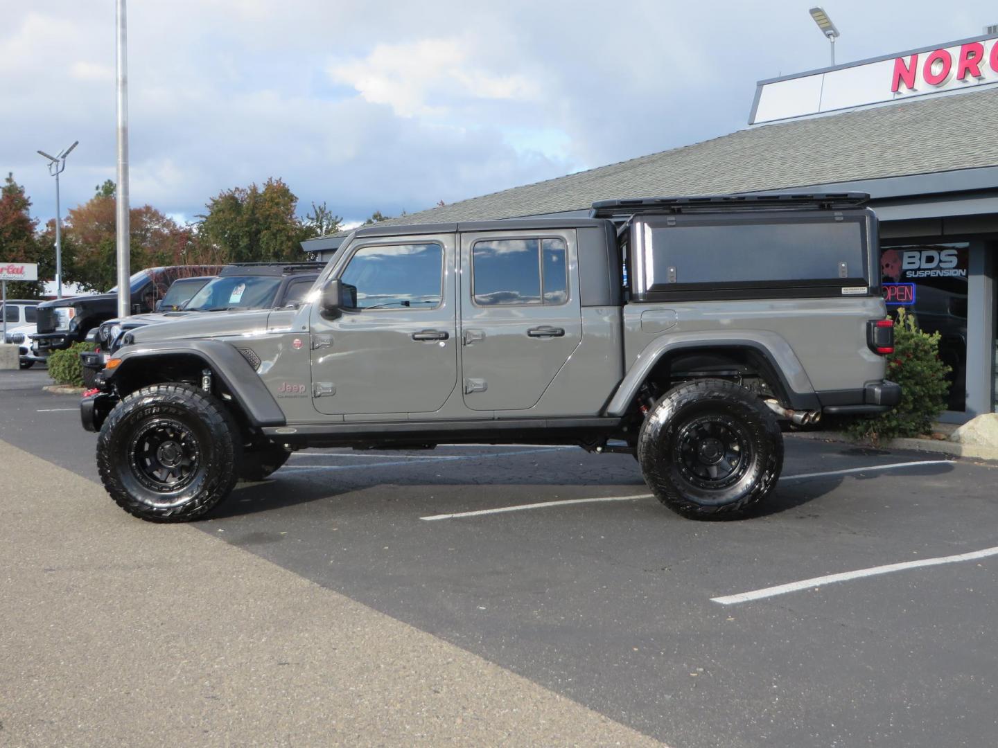 2020 CHARCOAL Jeep Gladiator Rubicon (1C6JJTBG9LL) with an 3.6L V6 DOHC 24V engine, 6M transmission, located at 2630 Grass Valley Highway, Auburn, CA, 95603, (530) 508-5100, 38.937893, -121.095482 - Clean Gladiator featuring a Mopar lift kit, Fox front shocks, Fox 2.5 DSC rear shocks, 37" Toyo RT tires, 17" Method wheels, Wan Winch, Mopar stinger bar, Vision X front leds, Rockslide Engineering power steps, RLD Camper shell, RLD Platform Roof Rack, RLD Kitchen Cabinet, RLD drop down table, Led b - Photo#7