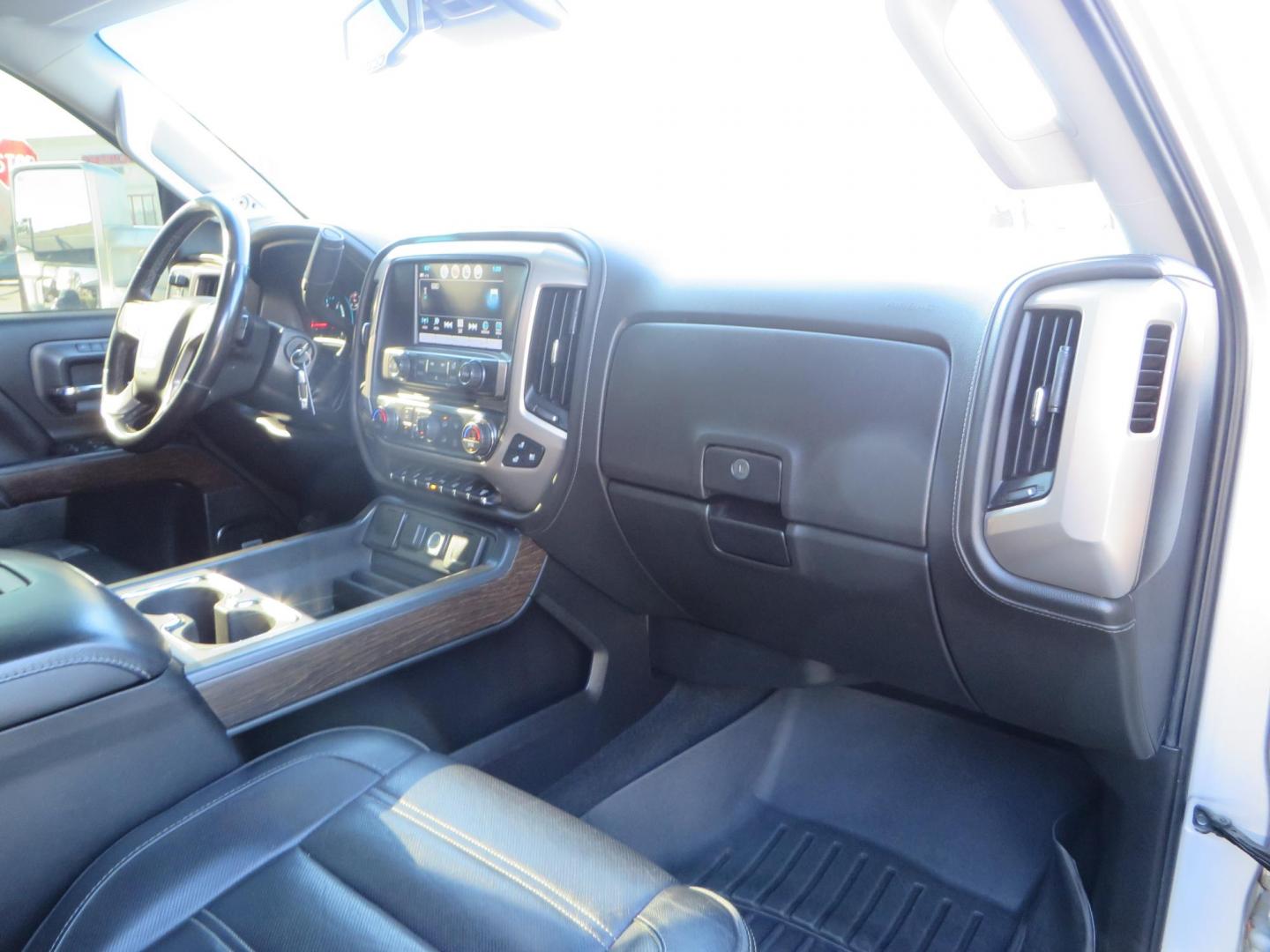 2018 SILVER GMC Sierra 2500HD Denali Crew Cab 4WD (1GT12UEY3JF) with an 6.6L V8 OHV 16 DIESEL engine, 6A transmission, located at 2630 Grass Valley Highway, Auburn, CA, 95603, (530) 508-5100, 38.937893, -121.095482 - Dont miss this Duramax.... Featuring a FTS leveling kit, Front Fox 2.0 remote reservoir shocks, Toyo RT Trail tires, Paint match all over, and Window tint. - Photo#51