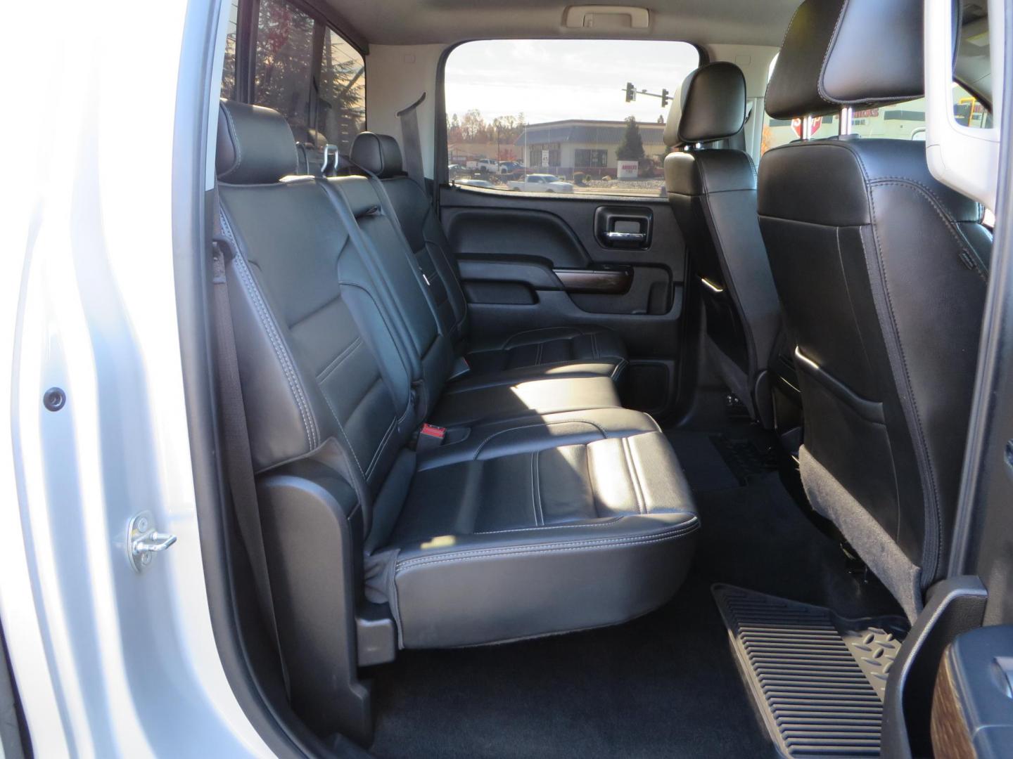 2018 SILVER GMC Sierra 2500HD Denali Crew Cab 4WD (1GT12UEY3JF) with an 6.6L V8 OHV 16 DIESEL engine, 6A transmission, located at 2630 Grass Valley Highway, Auburn, CA, 95603, (530) 508-5100, 38.937893, -121.095482 - Dont miss this Duramax.... Featuring a FTS leveling kit, Front Fox 2.0 remote reservoir shocks, Toyo RT Trail tires, Paint match all over, and Window tint. - Photo#54