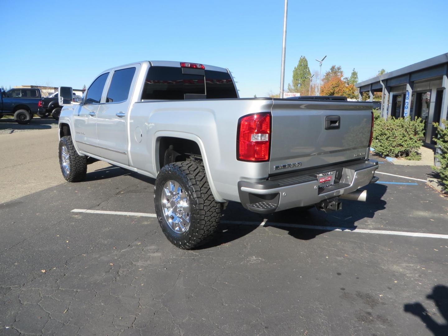 2018 SILVER GMC Sierra 2500HD Denali Crew Cab 4WD (1GT12UEY3JF) with an 6.6L V8 OHV 16 DIESEL engine, 6A transmission, located at 2630 Grass Valley Highway, Auburn, CA, 95603, (530) 508-5100, 38.937893, -121.095482 - Dont miss this Duramax.... Featuring a FTS leveling kit, Front Fox 2.0 remote reservoir shocks, Toyo RT Trail tires, Paint match all over, and Window tint. - Photo#6