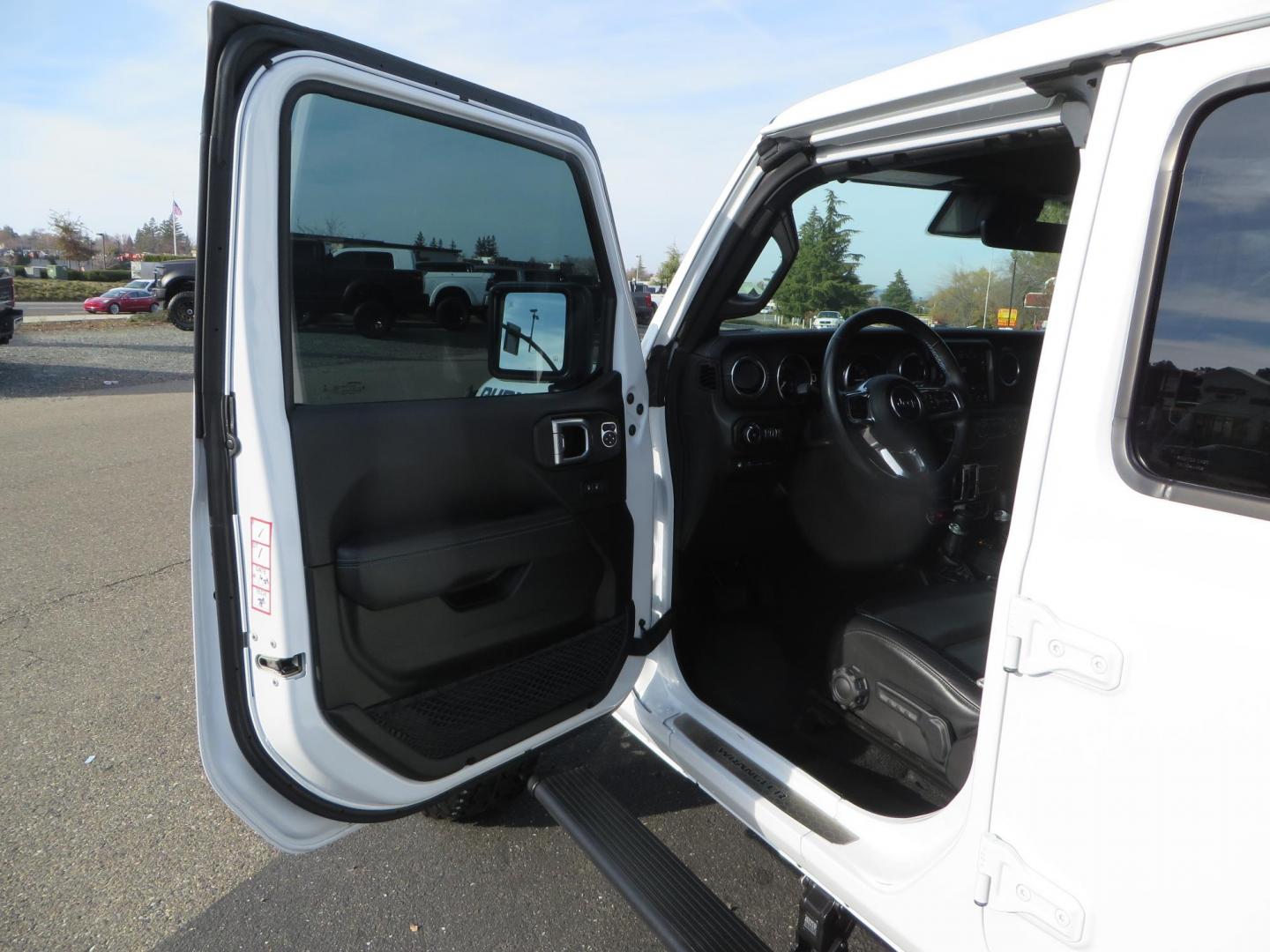 2021 White Jeep Wrangler Unlimited Rubicon 4XE (1C4JJXR62MW) with an 2.0L L4 DOHC 16V HYBRID engine, 8A transmission, located at 2630 Grass Valley Highway, Auburn, CA, 95603, (530) 508-5100, 38.937893, -121.095482 - 4xe Rubicon featuring a JKS suspension system, Fox adventure series shocks, 17" Method NV double black wheels, 37" Falken Wildpeak RT tires, Amp Power steps, Teraflex HD tire carrier, and window tint. - Photo#20