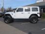 2021 White Jeep Wrangler Unlimited Rubicon 4XE (1C4JJXR62MW) with an 2.0L L4 DOHC 16V HYBRID engine, 8A transmission, located at 2630 Grass Valley Highway, Auburn, CA, 95603, (530) 508-5100, 38.937893, -121.095482 - 4xe Rubicon featuring a JKS suspension system, Fox adventure series shocks, 17" Method NV double black wheels, 37" Falken Wildpeak RT tires, Amp Power steps, Teraflex HD tire carrier, and window tint. - Photo#7