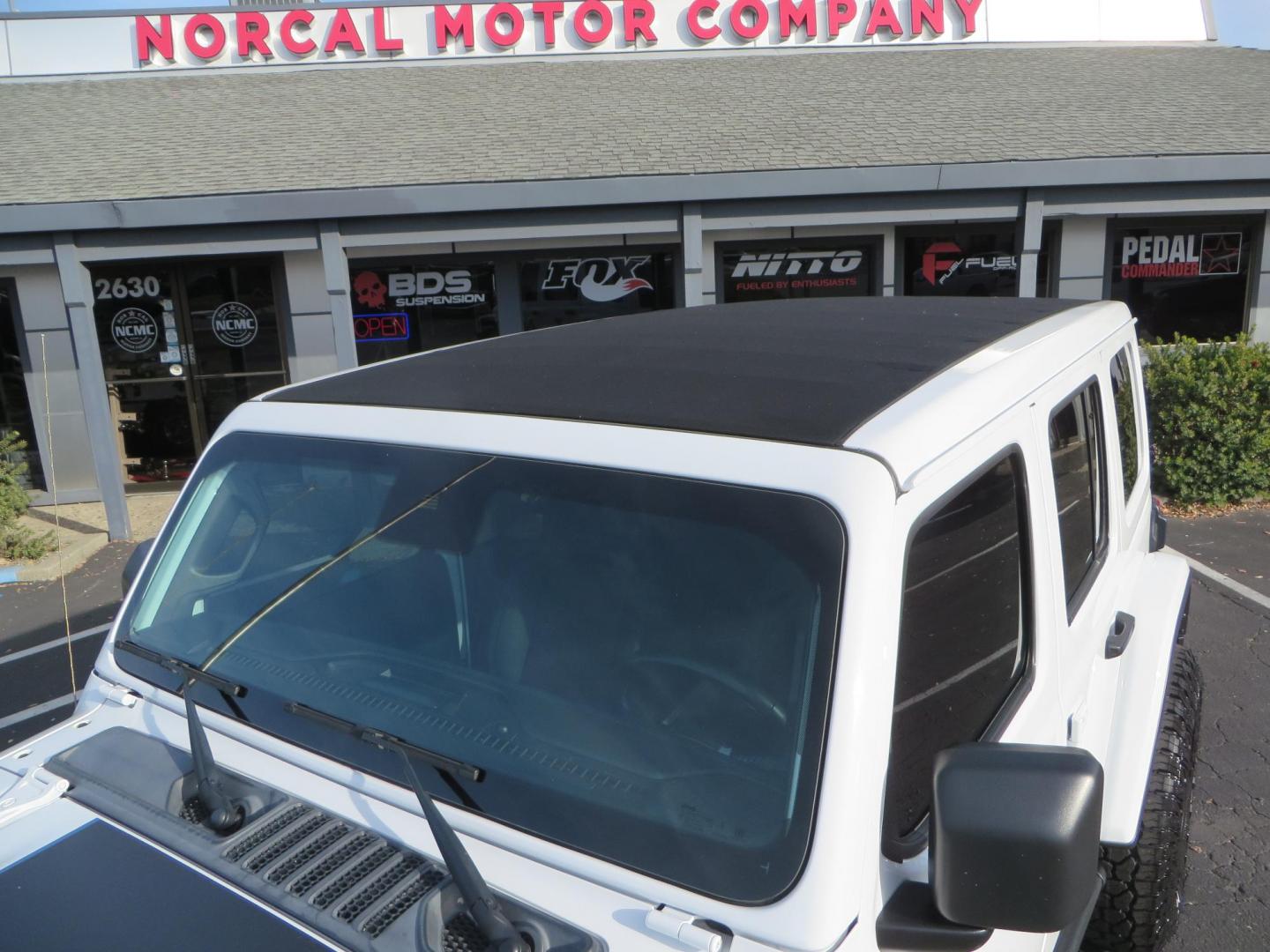 2021 White Jeep Wrangler Unlimited Rubicon 4XE (1C4JJXR62MW) with an 2.0L L4 DOHC 16V HYBRID engine, 8A transmission, located at 2630 Grass Valley Highway, Auburn, CA, 95603, (530) 508-5100, 38.937893, -121.095482 - 4xe Rubicon featuring a JKS suspension system, Fox adventure series shocks, 17" Method NV double black wheels, 37" Falken Wildpeak RT tires, Amp Power steps, Teraflex HD tire carrier, and window tint. - Photo#72