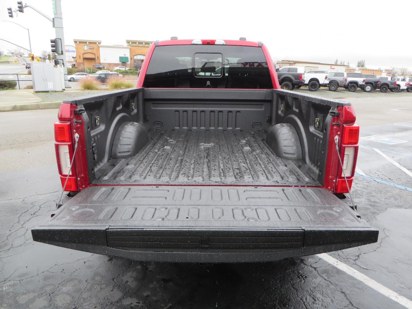 2020 Maroon /black Ford F-250 SD Lariat Crew Cab 4WD (1FT8W2BT1LE) with an 6.7L V8 OHV 16V DIESEL engine, 6A transmission, located at 2630 Grass Valley Highway, Auburn, CA, 95603, (530) 508-5100, 38.937893, -121.095482 - Features - 18" Method MR315 wheels, and 35" Nitto Ridge Grappler tires. - Photo#12