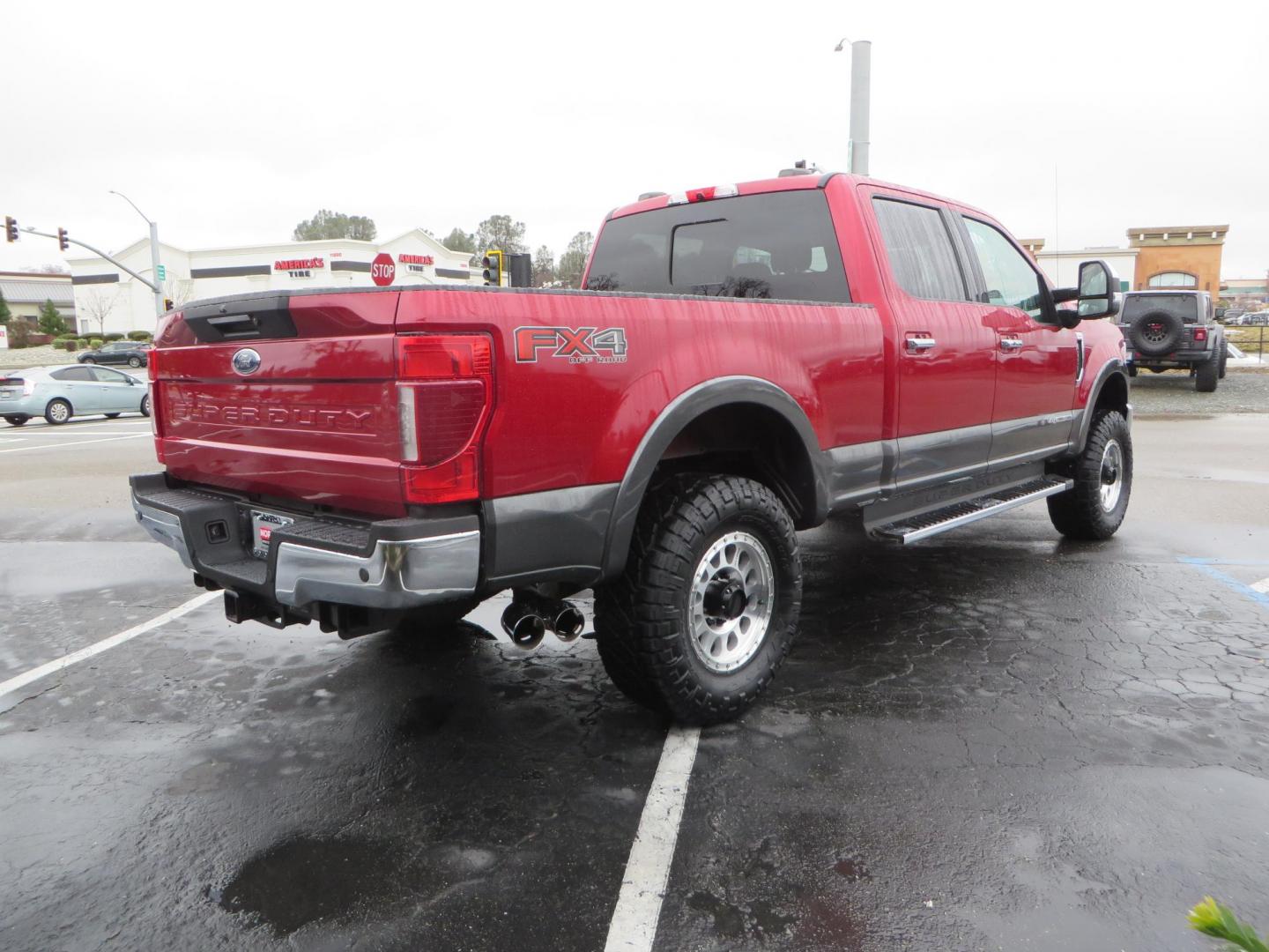 2020 Maroon /black Ford F-250 SD Lariat Crew Cab 4WD (1FT8W2BT1LE) with an 6.7L V8 OHV 16V DIESEL engine, 6A transmission, located at 2630 Grass Valley Highway, Auburn, CA, 95603, (530) 508-5100, 38.937893, -121.095482 - Features - 18" Method MR315 wheels, and 35" Nitto Ridge Grappler tires. - Photo#2