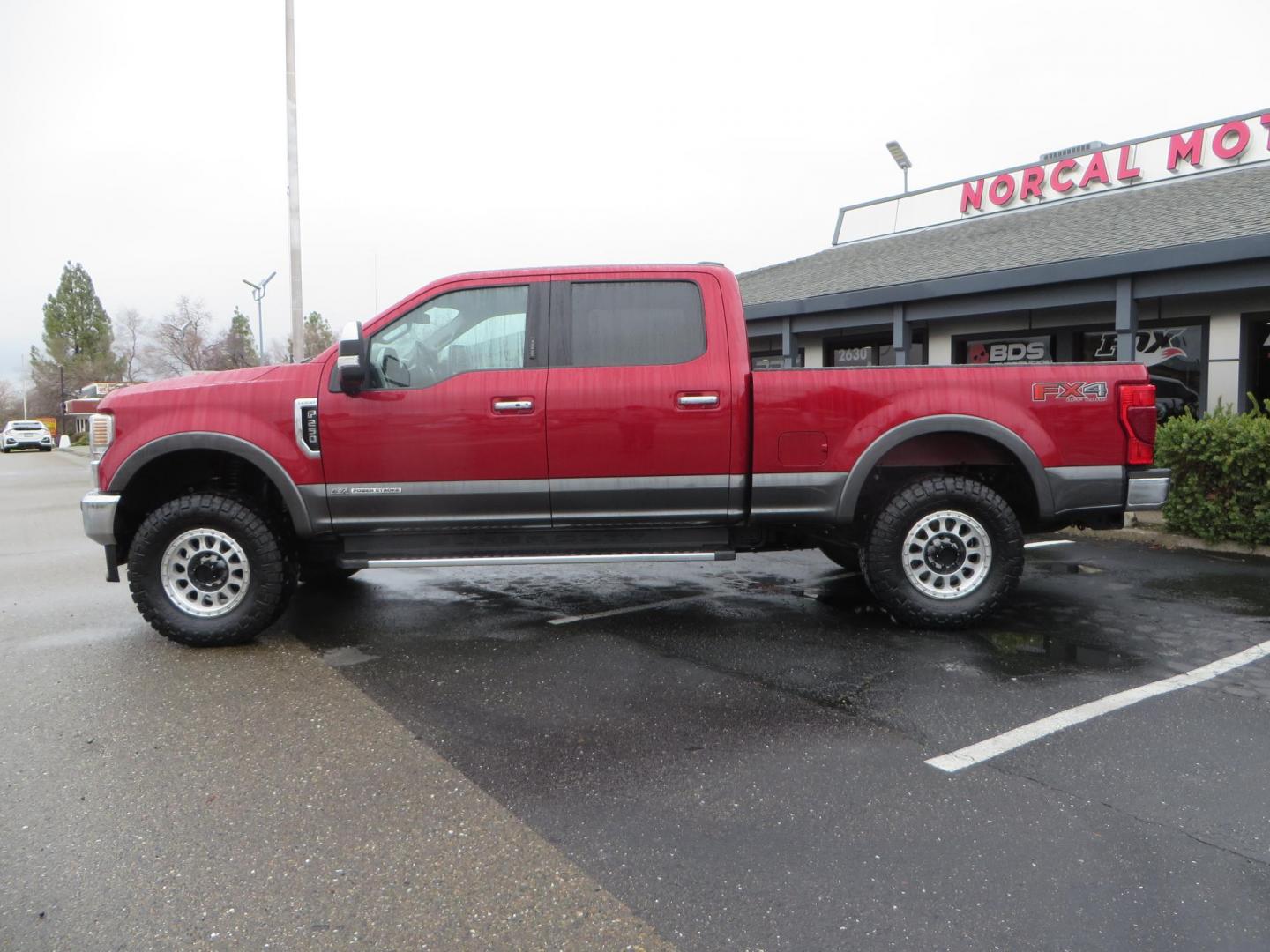 2020 Maroon /black Ford F-250 SD Lariat Crew Cab 4WD (1FT8W2BT1LE) with an 6.7L V8 OHV 16V DIESEL engine, 6A transmission, located at 2630 Grass Valley Highway, Auburn, CA, 95603, (530) 508-5100, 38.937893, -121.095482 - Features - 18" Method MR315 wheels, and 35" Nitto Ridge Grappler tires. - Photo#8