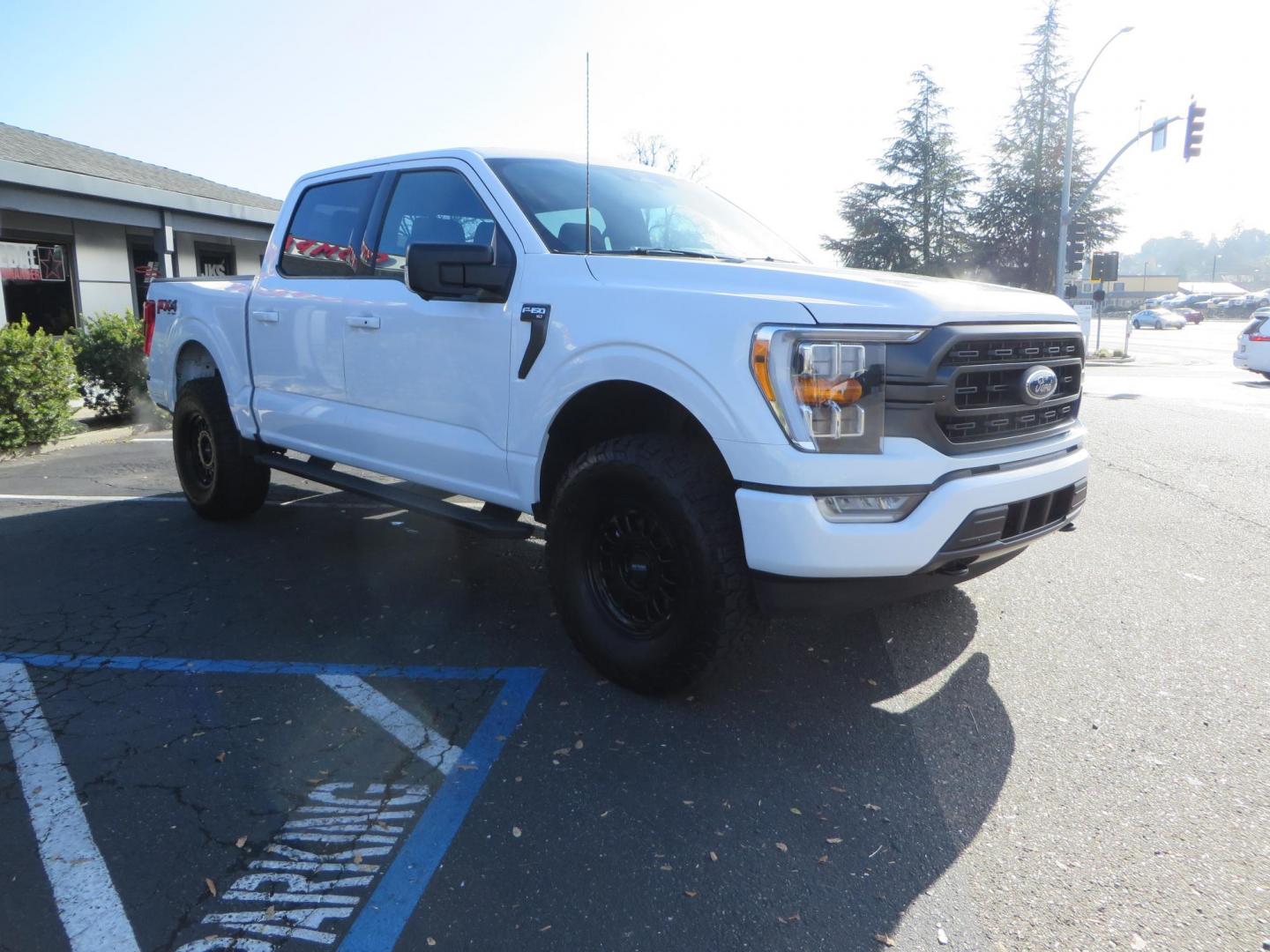 2022 White /BLACK Ford F-150 XLT SuperCrew 6.5-ft. Bed 4WD (1FTFW1E86NK) with an 3.5L V6 DOHC 24V engine, 6A transmission, located at 2630 Grass Valley Highway, Auburn, CA, 95603, (530) 508-5100, 38.937893, -121.095482 - Super Clean F150 Featuring Bilstein 5100 front struts, 17" Method MR318 wheels, 315/70r17 BFG KO2 tires, and window tint. - Photo#2