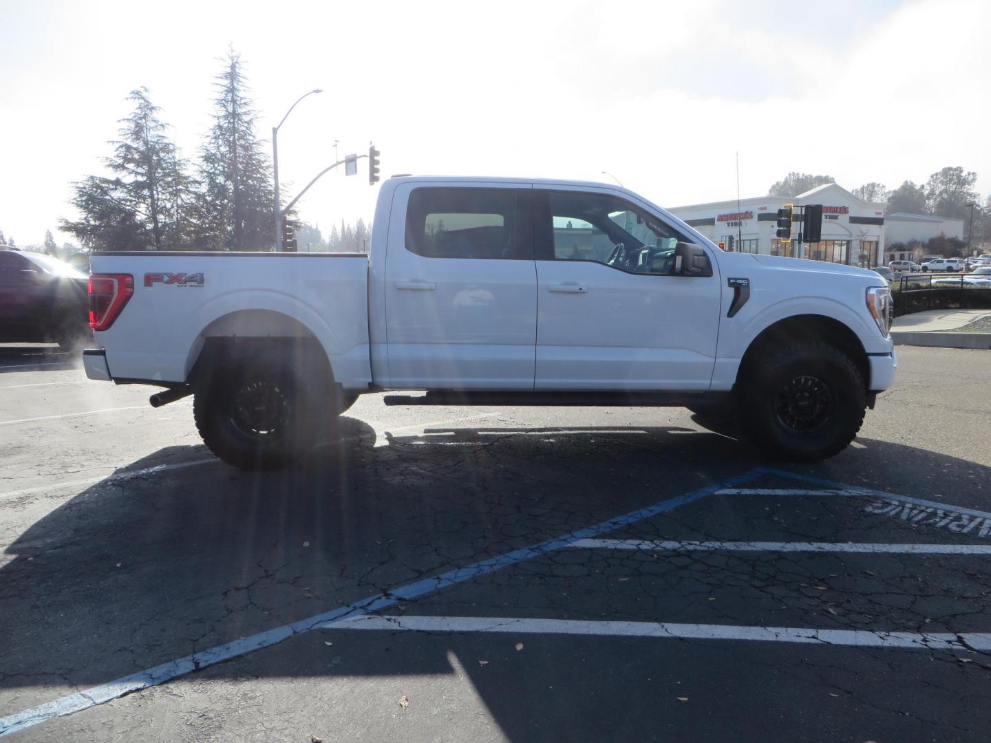 2022 White /BLACK Ford F-150 XLT SuperCrew 6.5-ft. Bed 4WD (1FTFW1E86NK) with an 3.5L V6 DOHC 24V engine, 6A transmission, located at 2630 Grass Valley Highway, Auburn, CA, 95603, (530) 508-5100, 38.937893, -121.095482 - Super Clean F150 Featuring Bilstein 5100 front struts, 17" Method MR318 wheels, 315/70r17 BFG KO2 tires, and window tint. - Photo#3