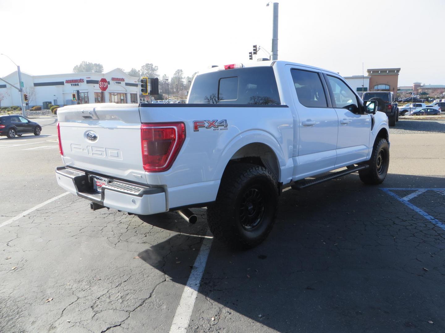 2022 White /BLACK Ford F-150 XLT SuperCrew 6.5-ft. Bed 4WD (1FTFW1E86NK) with an 3.5L V6 DOHC 24V engine, 6A transmission, located at 2630 Grass Valley Highway, Auburn, CA, 95603, (530) 508-5100, 38.937893, -121.095482 - Super Clean F150 Featuring Bilstein 5100 front struts, 17" Method MR318 wheels, 315/70r17 BFG KO2 tires, and window tint. - Photo#4