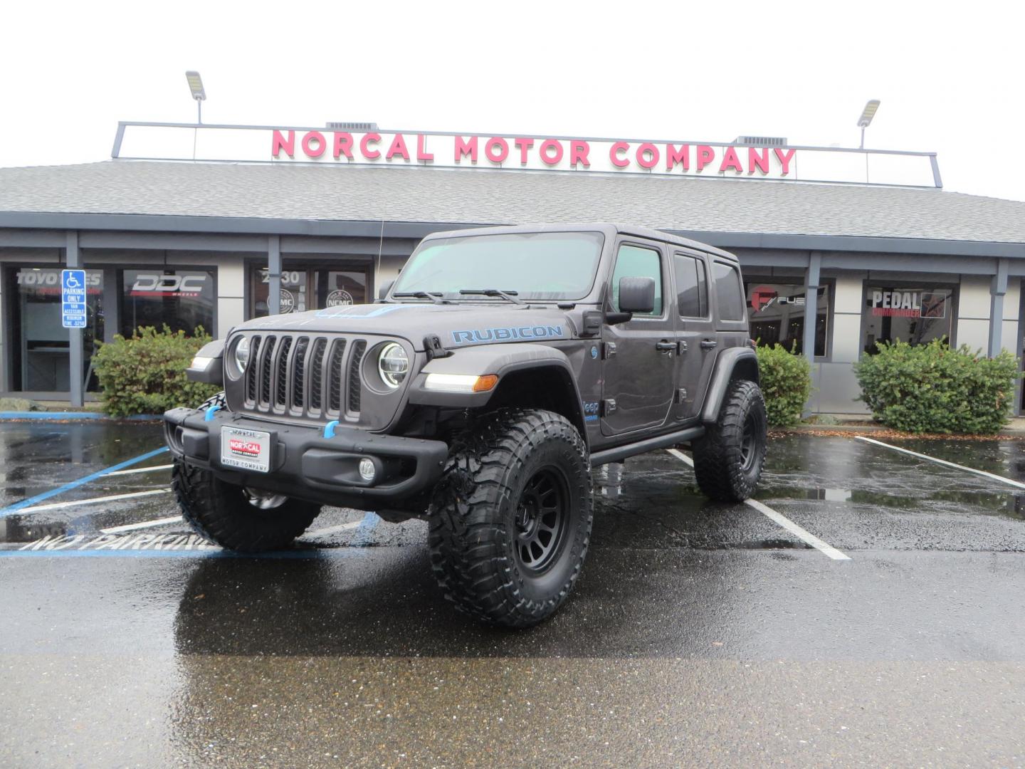 2021 CHARCOAL /BLACK Jeep Wrangler Unlimited Rubicon 4XE (1C4JJXR68MW) with an 2.0L L4 DOHC 16V HYBRID engine, 8A transmission, located at 2630 Grass Valley Highway, Auburn, CA, 95603, (530) 508-5100, 38.937893, -121.095482 - 4xe Rubicon sitting on a JKS suspension system, Fox shocks, 17" Method MR703 beadgrip wheels, 37" Toyo MT tires, and a Teraflex HD spare tire carrier. - Photo#0