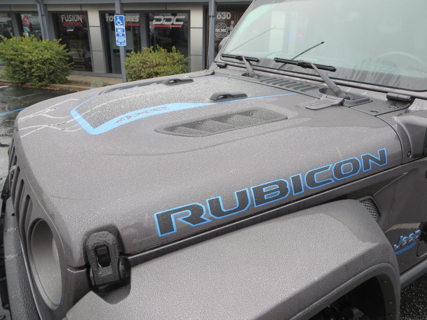 2021 CHARCOAL /BLACK Jeep Wrangler Unlimited Rubicon 4XE (1C4JJXR68MW) with an 2.0L L4 DOHC 16V HYBRID engine, 8A transmission, located at 2630 Grass Valley Highway, Auburn, CA, 95603, (530) 508-5100, 38.937893, -121.095482 - 4xe Rubicon sitting on a JKS suspension system, Fox shocks, 17" Method MR703 beadgrip wheels, 37" Toyo MT tires, and a Teraflex HD spare tire carrier. - Photo#12