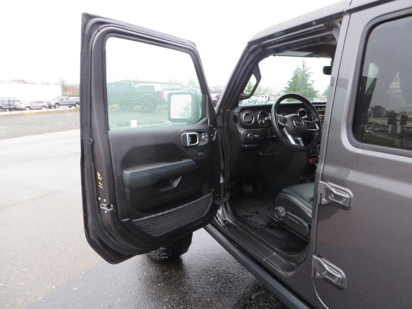 2021 CHARCOAL /BLACK Jeep Wrangler Unlimited Rubicon 4XE (1C4JJXR68MW) with an 2.0L L4 DOHC 16V HYBRID engine, 8A transmission, located at 2630 Grass Valley Highway, Auburn, CA, 95603, (530) 508-5100, 38.937893, -121.095482 - 4xe Rubicon sitting on a JKS suspension system, Fox shocks, 17" Method MR703 beadgrip wheels, 37" Toyo MT tires, and a Teraflex HD spare tire carrier. - Photo#18