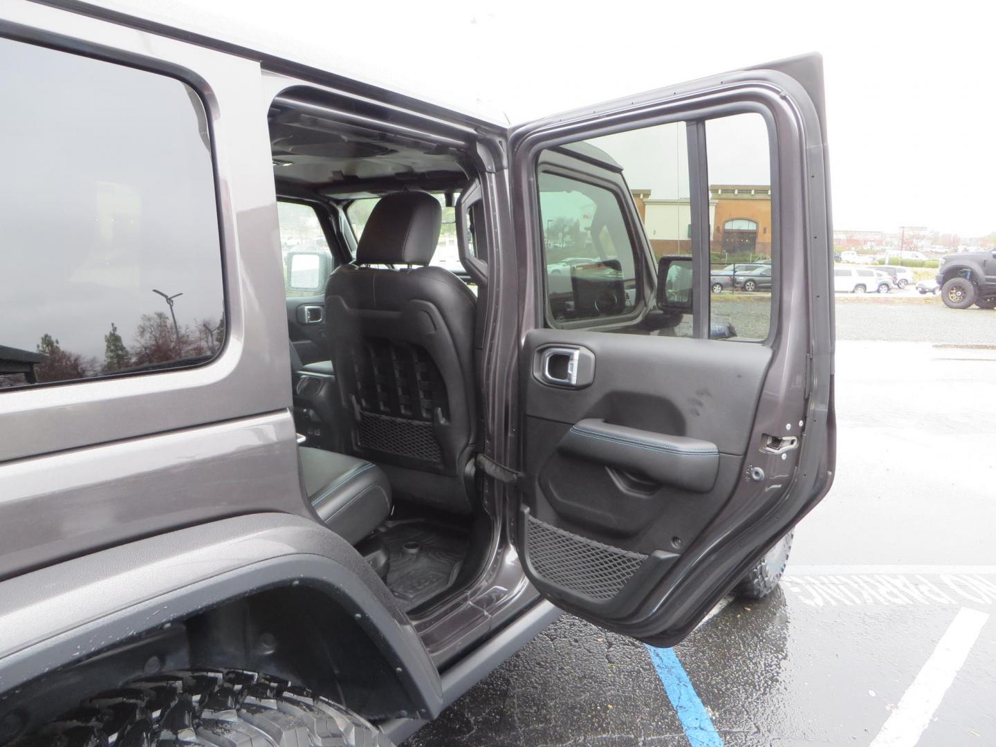 2021 CHARCOAL /BLACK Jeep Wrangler Unlimited Rubicon 4XE (1C4JJXR68MW) with an 2.0L L4 DOHC 16V HYBRID engine, 8A transmission, located at 2630 Grass Valley Highway, Auburn, CA, 95603, (530) 508-5100, 38.937893, -121.095482 - 4xe Rubicon sitting on a JKS suspension system, Fox shocks, 17" Method MR703 beadgrip wheels, 37" Toyo MT tires, and a Teraflex HD spare tire carrier. - Photo#59