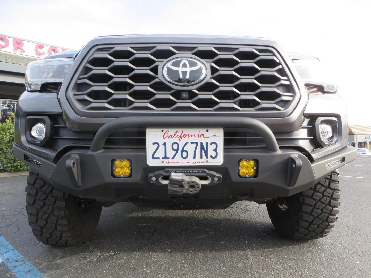 2022 CHARCOAL /BLACK Toyota Tacoma TRD Off-Road Double Cab V6 6AT 4WD (3TMCZ5AN0NM) with an 3.5L V6 DOHC 24V engine, 6A transmission, located at 2630 Grass Valley Highway, Auburn, CA, 95603, (530) 508-5100, 38.937893, -121.095482 - Must See Tacoma with a ton of extras!!! This Tacoma Features a Stage 9 Icon Vehicle Dyanamics suspension system, 17" Method MR305 double black wheels, BFG KM3 tires, Tacoma Beast Slider steps, 4WP front bumper, Baja designs Squadron Sport front bumper lights, Baja Designs XL Linkable light bar, Smit - Photo#13