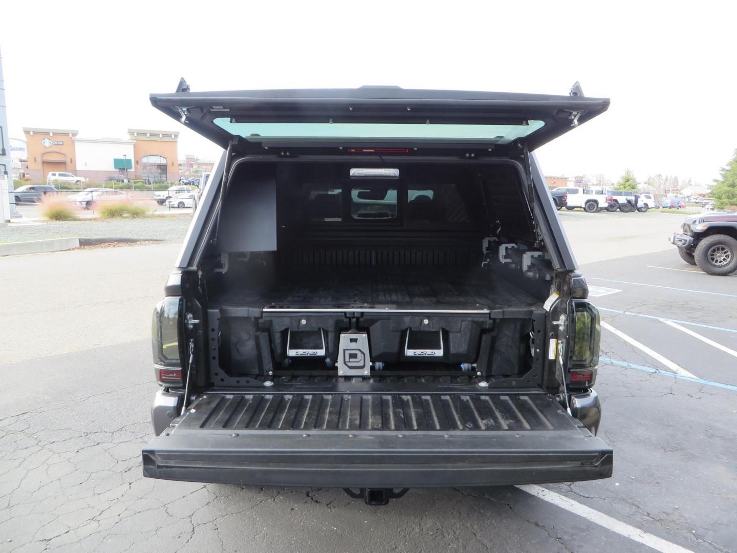 2022 CHARCOAL /BLACK Toyota Tacoma TRD Off-Road Double Cab V6 6AT 4WD (3TMCZ5AN0NM) with an 3.5L V6 DOHC 24V engine, 6A transmission, located at 2630 Grass Valley Highway, Auburn, CA, 95603, (530) 508-5100, 38.937893, -121.095482 - Must See Tacoma with a ton of extras!!! This Tacoma Features a Stage 9 Icon Vehicle Dyanamics suspension system, 17" Method MR305 double black wheels, BFG KM3 tires, Tacoma Beast Slider steps, 4WP front bumper, Baja designs Squadron Sport front bumper lights, Baja Designs XL Linkable light bar, Smit - Photo#24