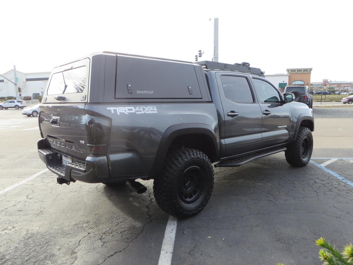 2022 CHARCOAL /BLACK Toyota Tacoma TRD Off-Road Double Cab V6 6AT 4WD (3TMCZ5AN0NM) with an 3.5L V6 DOHC 24V engine, 6A transmission, located at 2630 Grass Valley Highway, Auburn, CA, 95603, (530) 508-5100, 38.937893, -121.095482 - Must See Tacoma with a ton of extras!!! This Tacoma Features a Stage 9 Icon Vehicle Dyanamics suspension system, 17" Method MR305 double black wheels, BFG KM3 tires, Tacoma Beast Slider steps, 4WP front bumper, Baja designs Squadron Sport front bumper lights, Baja Designs XL Linkable light bar, Smit - Photo#4