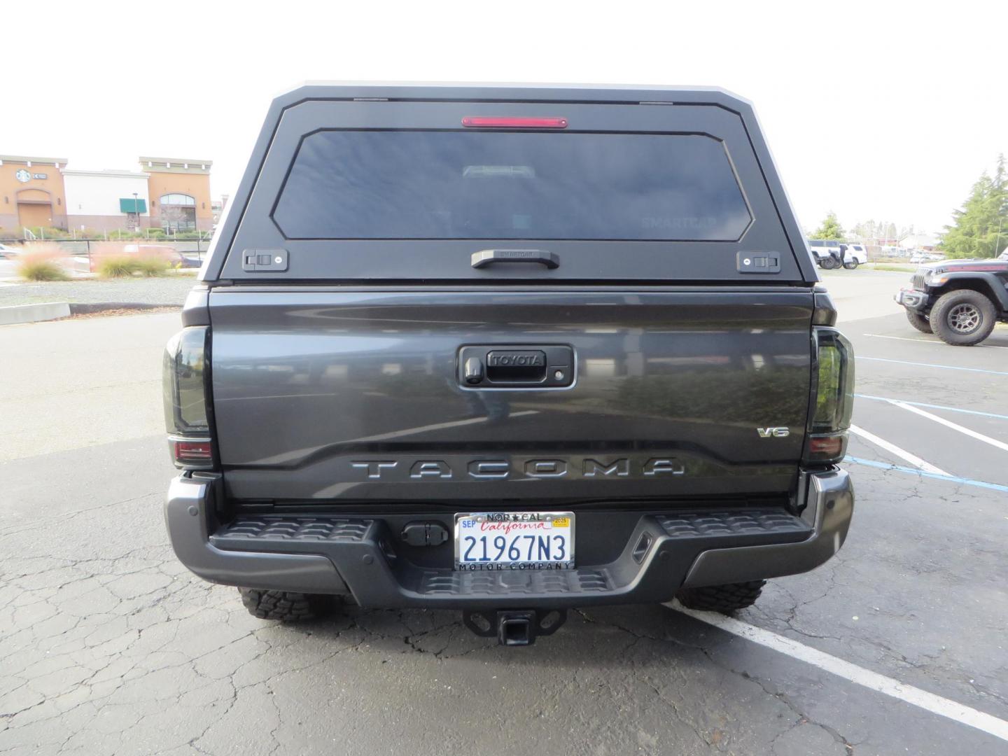 2022 CHARCOAL /BLACK Toyota Tacoma TRD Off-Road Double Cab V6 6AT 4WD (3TMCZ5AN0NM) with an 3.5L V6 DOHC 24V engine, 6A transmission, located at 2630 Grass Valley Highway, Auburn, CA, 95603, (530) 508-5100, 38.937893, -121.095482 - Must See Tacoma with a ton of extras!!! This Tacoma Features a Stage 9 Icon Vehicle Dyanamics suspension system, 17" Method MR305 double black wheels, BFG KM3 tires, Tacoma Beast Slider steps, 4WP front bumper, Baja designs Squadron Sport front bumper lights, Baja Designs XL Linkable light bar, Smit - Photo#5