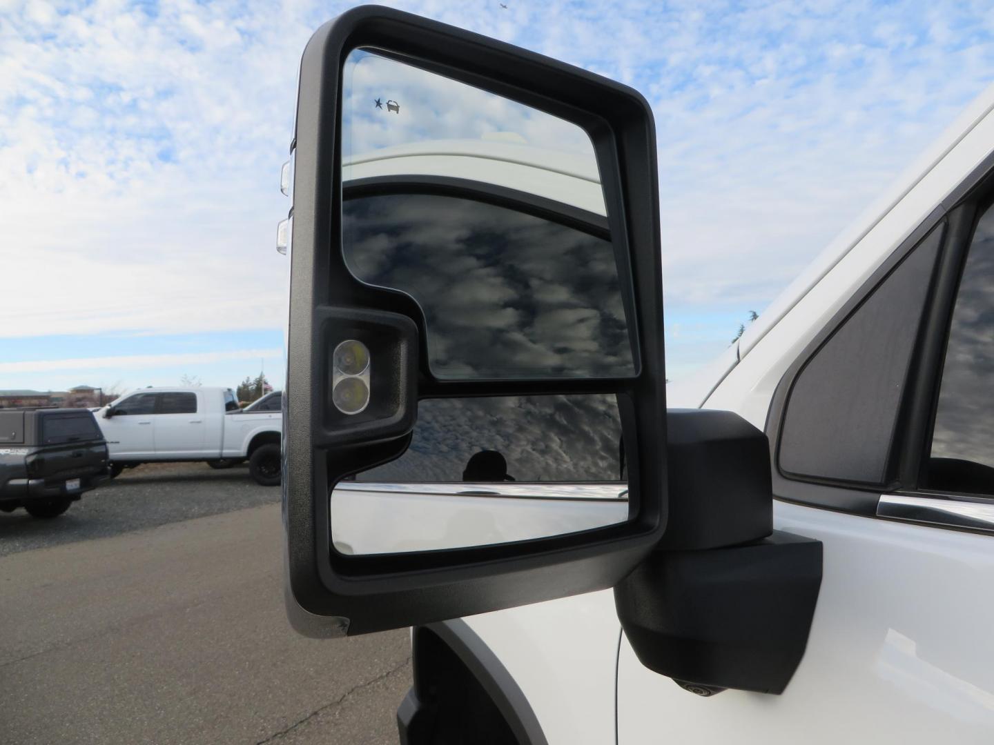 2022 White /Black Chevrolet Silverado 3500HD High Country Crew Cab 4WD (1GC4YVEY0NF) with an 6.6L V8 OHV 32V TURBO DIESEL engine, 6A transmission, located at 2630 Grass Valley Highway, Auburn, CA, 95603, (530) 508-5100, 38.937893, -121.095482 - Must see High Country Dually featuring a CST lift kit, 20" DDC wheels, Toyo Open Country RT Trail tires, Road Armor front and rear bumpers, Road Armor 12k Winch, Westin LED lights, and Window tint. - Photo#27