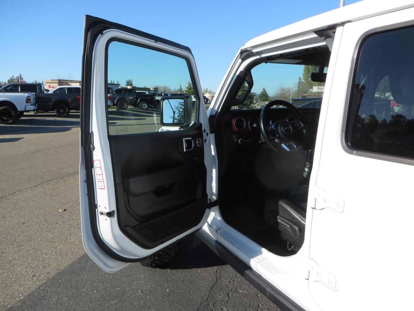 2020 White /Black Jeep Wrangler Unlimited Rubicon (1C4HJXFN2LW) with an 2.0L L4 DOHC 16V TURBO engine, 6A transmission, located at 2630 Grass Valley Highway, Auburn, CA, 95603, (530) 508-5100, 38.937893, -121.095482 - Featuring a Zone offroad suspension system, Fox shocks, 17" Method NV wheels, 37" Nitto Ridge Grappler tires, and a Teraflex HD tire carrier. - Photo#19