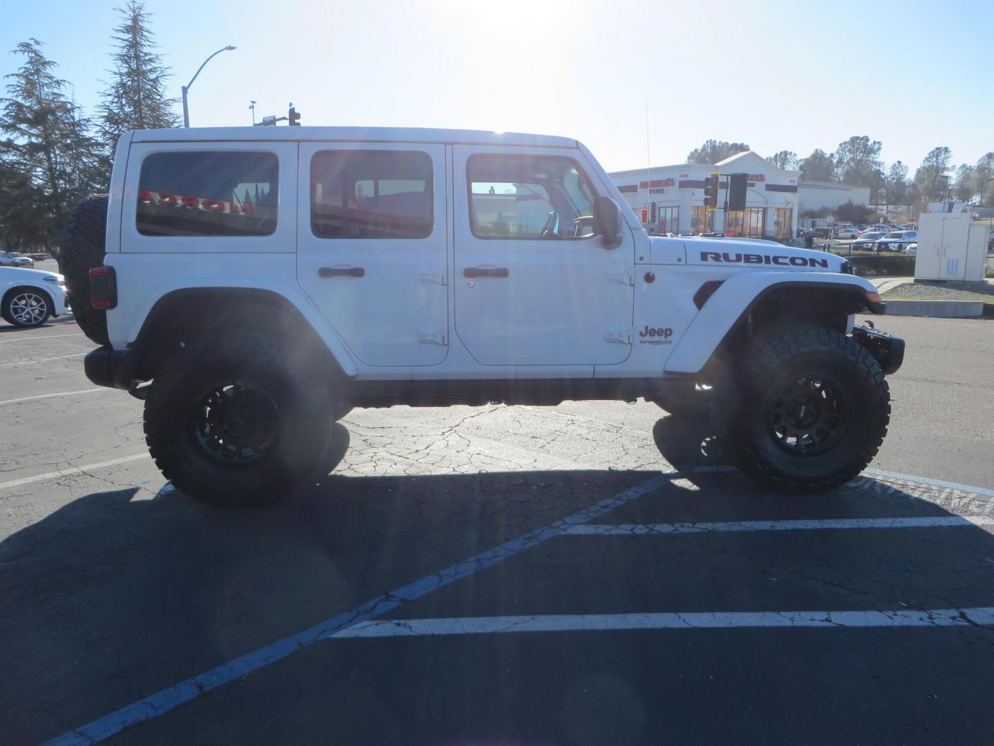 2020 White /Black Jeep Wrangler Unlimited Rubicon (1C4HJXFN2LW) with an 2.0L L4 DOHC 16V TURBO engine, 6A transmission, located at 2630 Grass Valley Highway, Auburn, CA, 95603, (530) 508-5100, 38.937893, -121.095482 - Featuring a Zone offroad suspension system, Fox shocks, 17" Method NV wheels, 37" Nitto Ridge Grappler tires, and a Teraflex HD tire carrier. - Photo#3