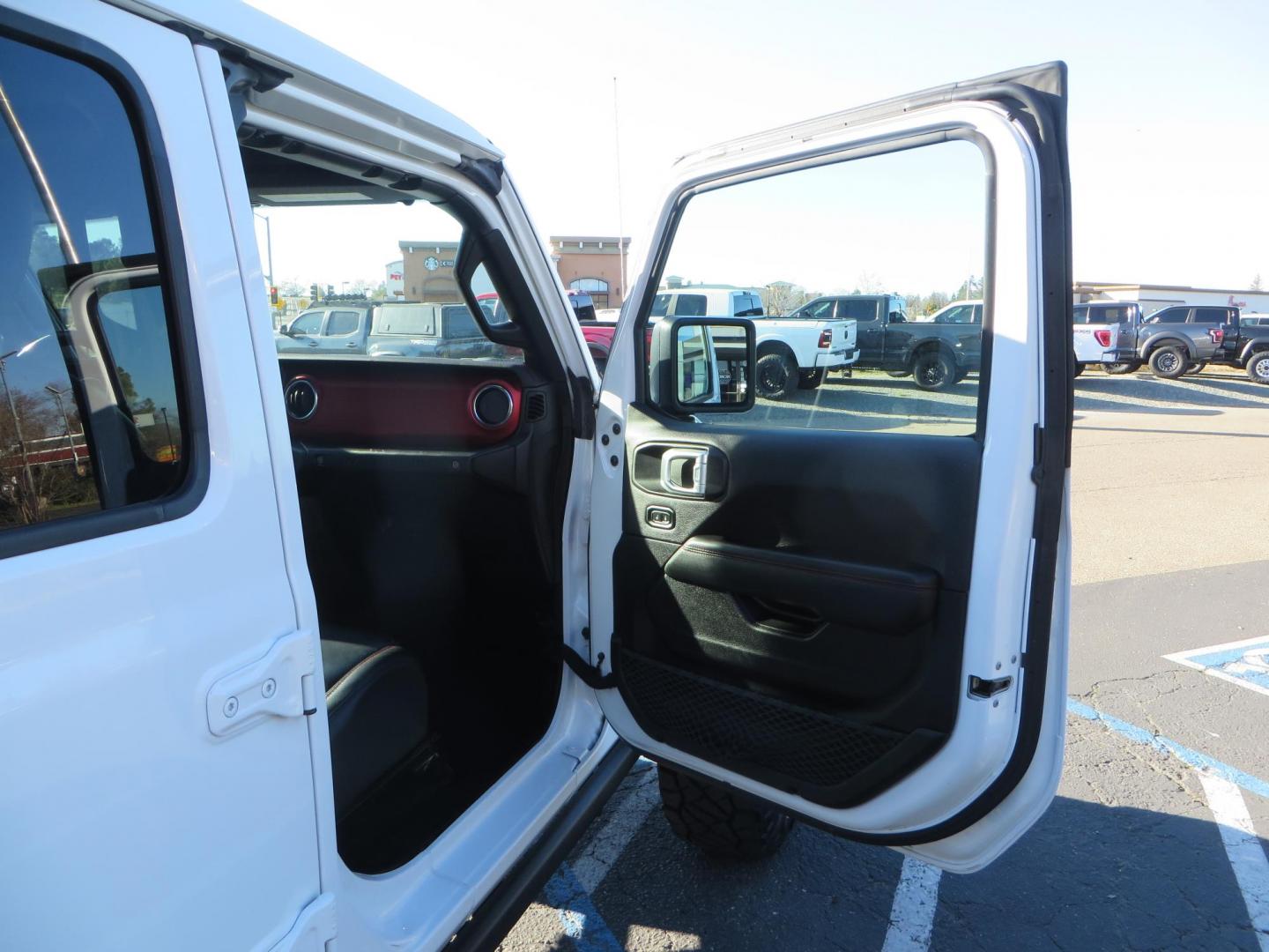 2020 White /Black Jeep Wrangler Unlimited Rubicon (1C4HJXFN2LW) with an 2.0L L4 DOHC 16V TURBO engine, 6A transmission, located at 2630 Grass Valley Highway, Auburn, CA, 95603, (530) 508-5100, 38.937893, -121.095482 - Featuring a Zone offroad suspension system, Fox shocks, 17" Method NV wheels, 37" Nitto Ridge Grappler tires, and a Teraflex HD tire carrier. - Photo#48