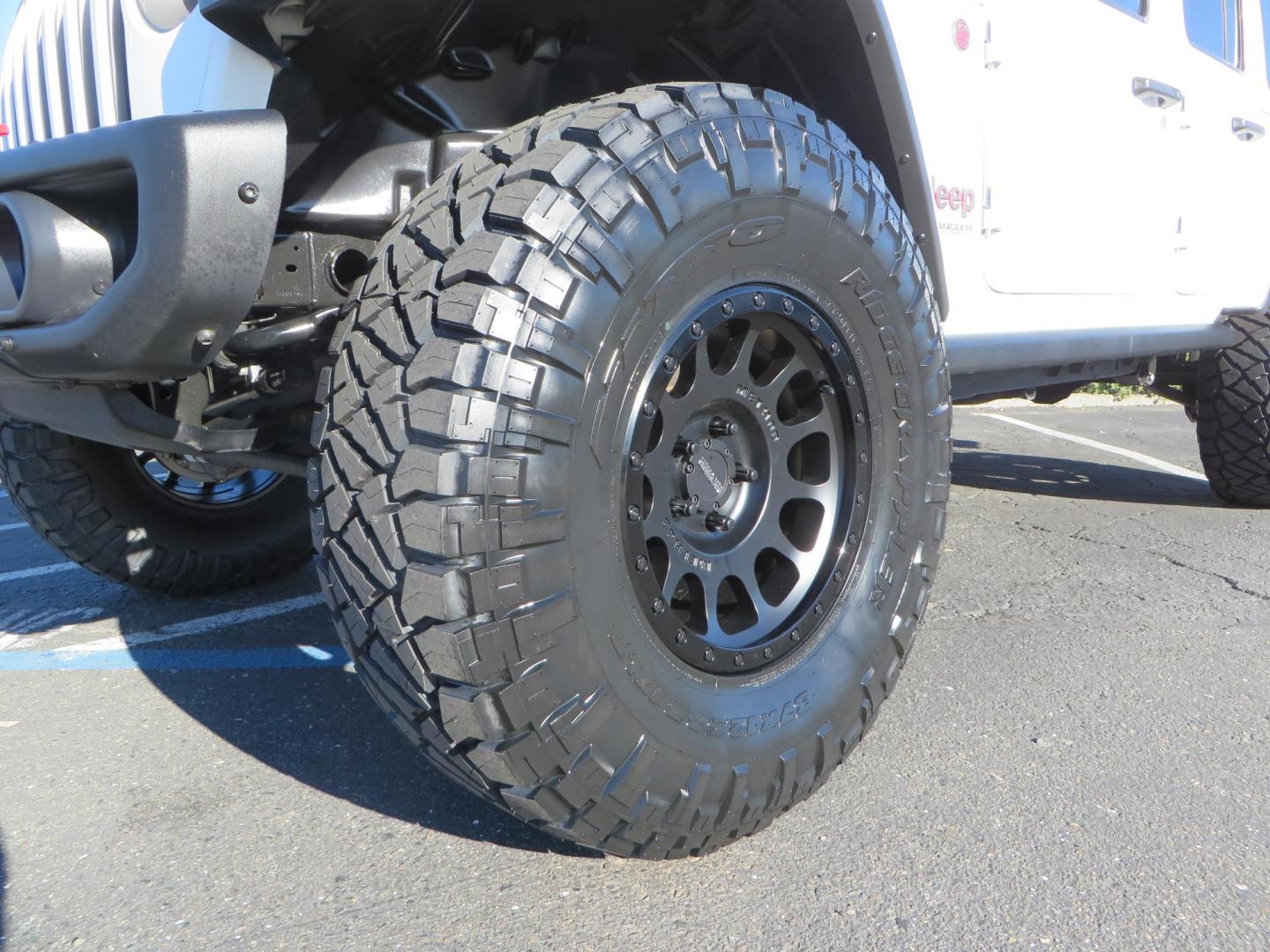 2020 White /Black Jeep Wrangler Unlimited Rubicon (1C4HJXFN2LW) with an 2.0L L4 DOHC 16V TURBO engine, 6A transmission, located at 2630 Grass Valley Highway, Auburn, CA, 95603, (530) 508-5100, 38.937893, -121.095482 - Featuring a Zone offroad suspension system, Fox shocks, 17" Method NV wheels, 37" Nitto Ridge Grappler tires, and a Teraflex HD tire carrier. - Photo#9