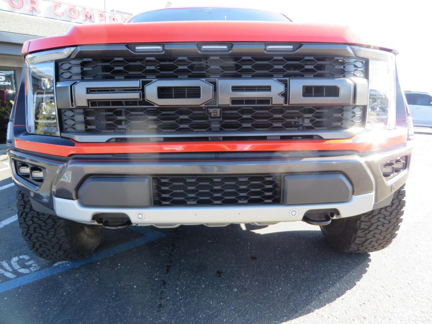 2023 Orange /Blue Ford F-150 Raptor 37 SuperCrew 4WD (1FTFW1RG4PF) with an 3.5 V6 engine, 6A transmission, located at 2630 Grass Valley Highway, Auburn, CA, 95603, (530) 508-5100, 38.937893, -121.095482 - Clean one owner Raptor 37 with Recaro Blue Accent seats, Pro Power Onboard 2K Generator, Power Tailgate, and Twin Panel Moonroof. - Photo#12