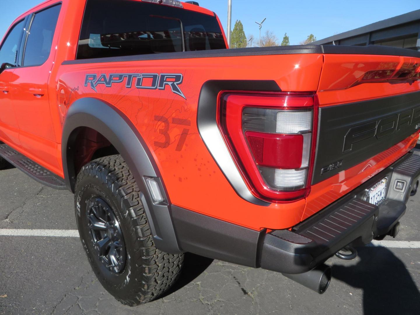 2023 Orange /Blue Ford F-150 Raptor 37 SuperCrew 4WD (1FTFW1RG4PF) with an 3.5 V6 engine, 6A transmission, located at 2630 Grass Valley Highway, Auburn, CA, 95603, (530) 508-5100, 38.937893, -121.095482 - Clean one owner Raptor 37 with Recaro Blue Accent seats, Pro Power Onboard 2K Generator, Power Tailgate, and Twin Panel Moonroof. - Photo#15