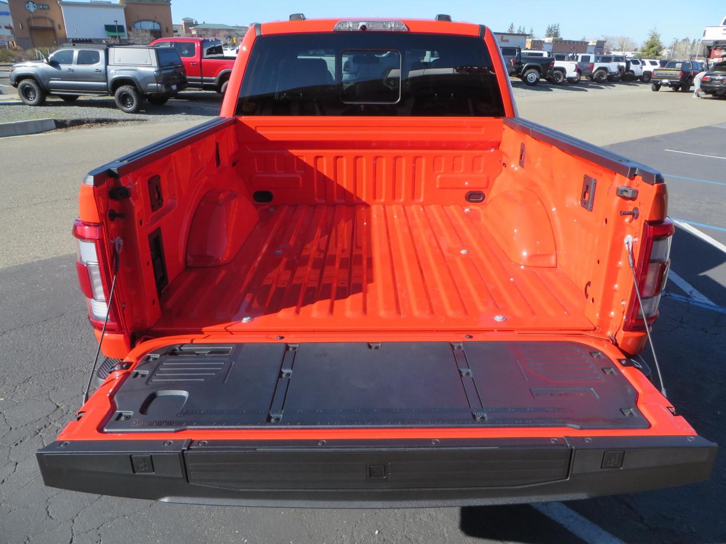 2023 Orange /Blue Ford F-150 Raptor 37 SuperCrew 4WD (1FTFW1RG4PF) with an 3.5 V6 engine, 6A transmission, located at 2630 Grass Valley Highway, Auburn, CA, 95603, (530) 508-5100, 38.937893, -121.095482 - Clean one owner Raptor 37 with Recaro Blue Accent seats, Pro Power Onboard 2K Generator, Power Tailgate, and Twin Panel Moonroof. - Photo#17