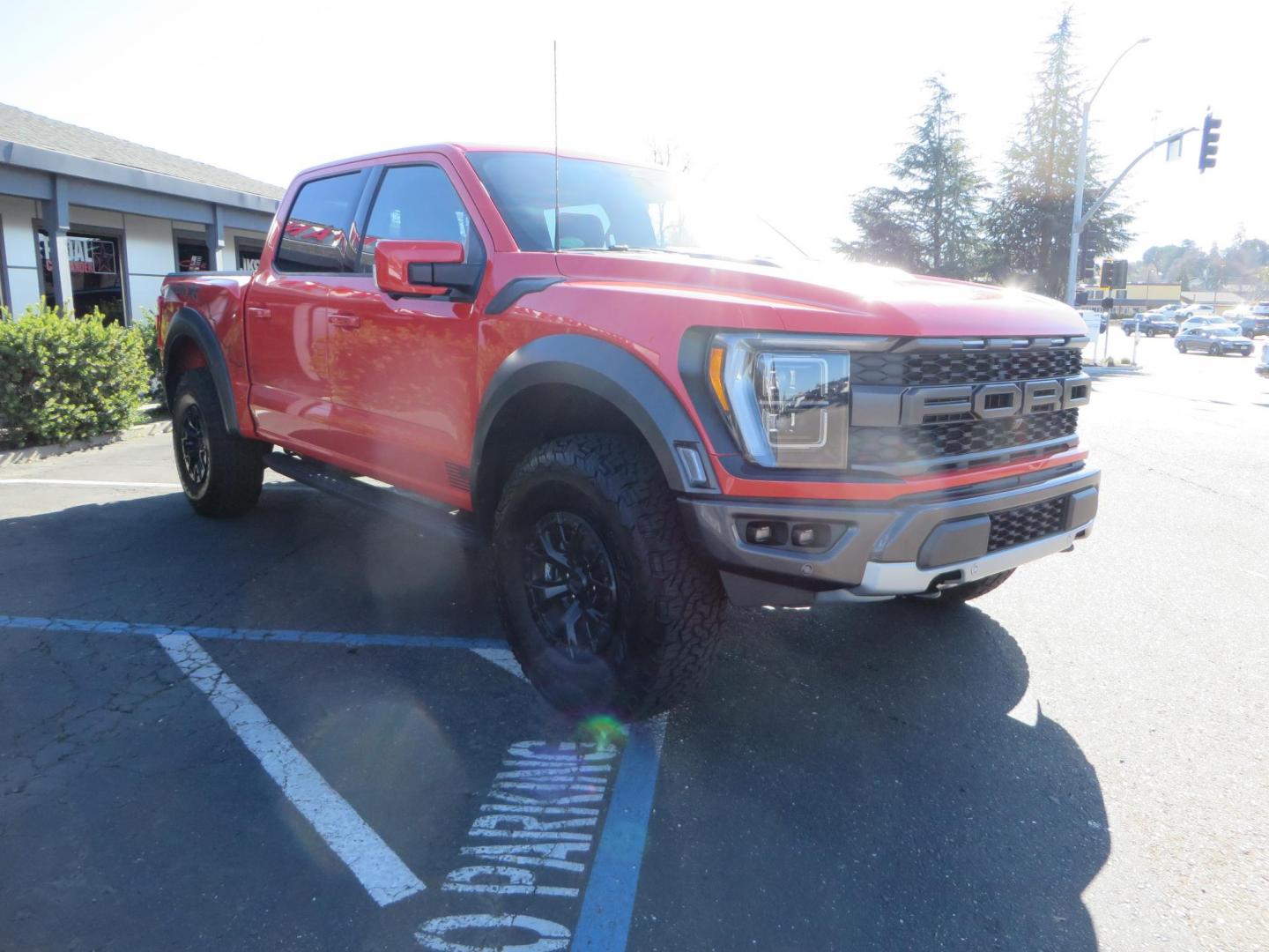 2023 Orange /Blue Ford F-150 Raptor 37 SuperCrew 4WD (1FTFW1RG4PF) with an 3.5 V6 engine, 6A transmission, located at 2630 Grass Valley Highway, Auburn, CA, 95603, (530) 508-5100, 38.937893, -121.095482 - Clean one owner Raptor 37 with Recaro Blue Accent seats, Pro Power Onboard 2K Generator, Power Tailgate, and Twin Panel Moonroof. - Photo#2