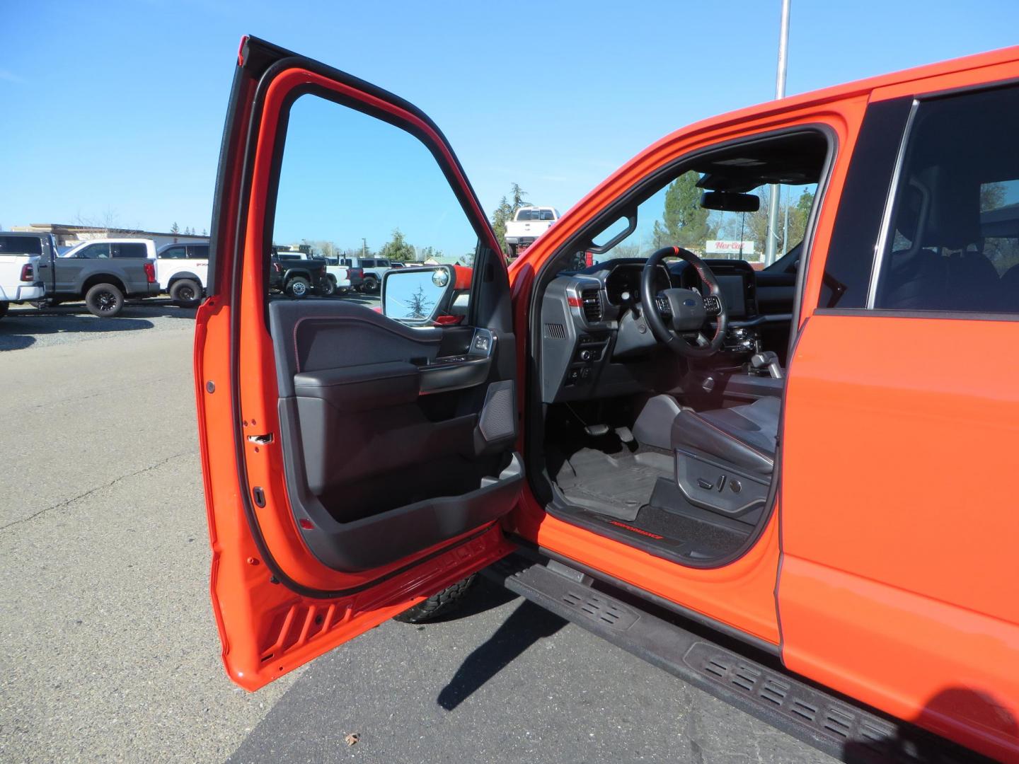 2023 Orange /Blue Ford F-150 Raptor 37 SuperCrew 4WD (1FTFW1RG4PF) with an 3.5 V6 engine, 6A transmission, located at 2630 Grass Valley Highway, Auburn, CA, 95603, (530) 508-5100, 38.937893, -121.095482 - Clean one owner Raptor 37 with Recaro Blue Accent seats, Pro Power Onboard 2K Generator, Power Tailgate, and Twin Panel Moonroof. - Photo#26