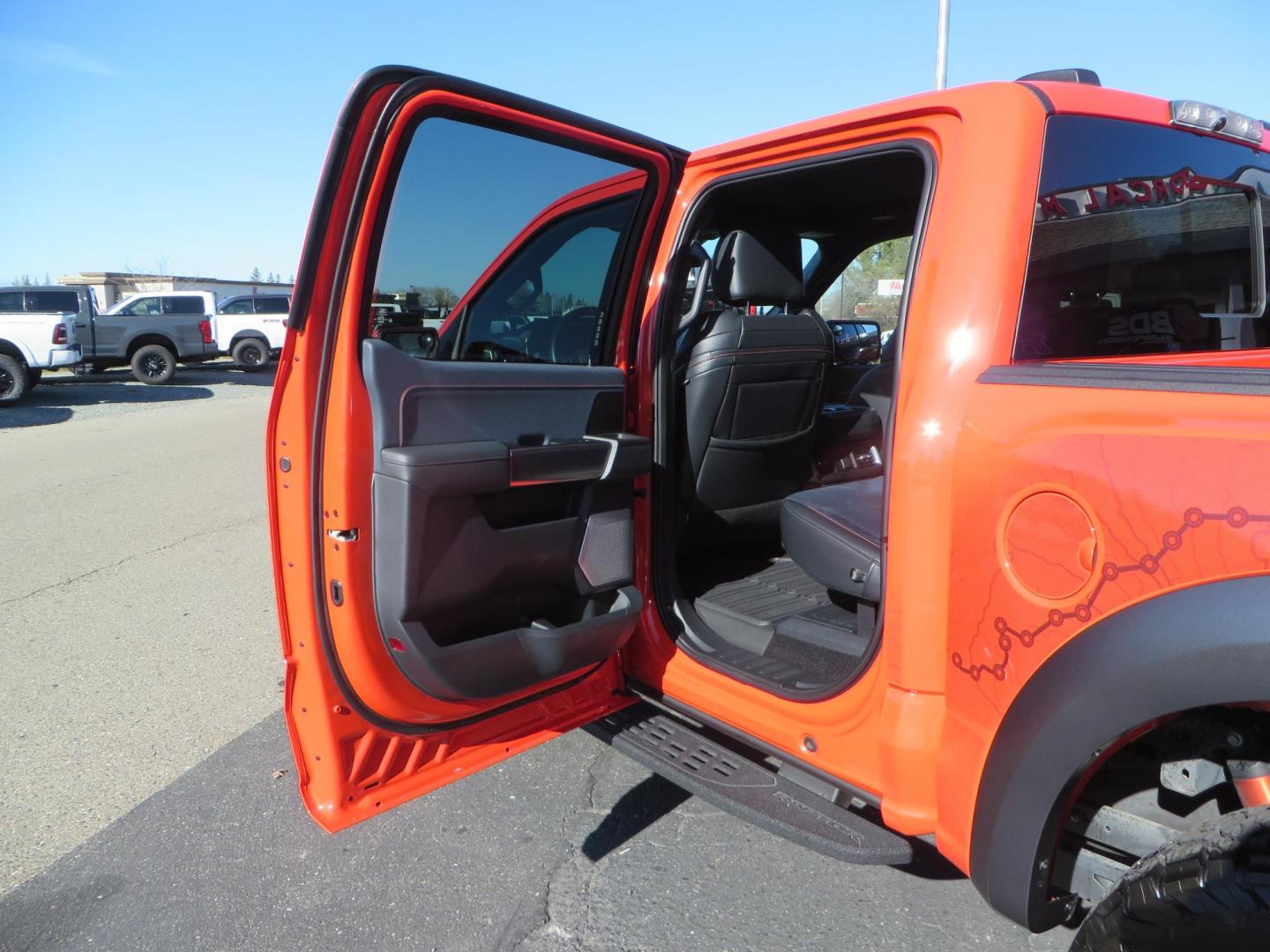 2023 Orange /Blue Ford F-150 Raptor 37 SuperCrew 4WD (1FTFW1RG4PF) with an 3.5 V6 engine, 6A transmission, located at 2630 Grass Valley Highway, Auburn, CA, 95603, (530) 508-5100, 38.937893, -121.095482 - Clean one owner Raptor 37 with Recaro Blue Accent seats, Pro Power Onboard 2K Generator, Power Tailgate, and Twin Panel Moonroof. - Photo#58