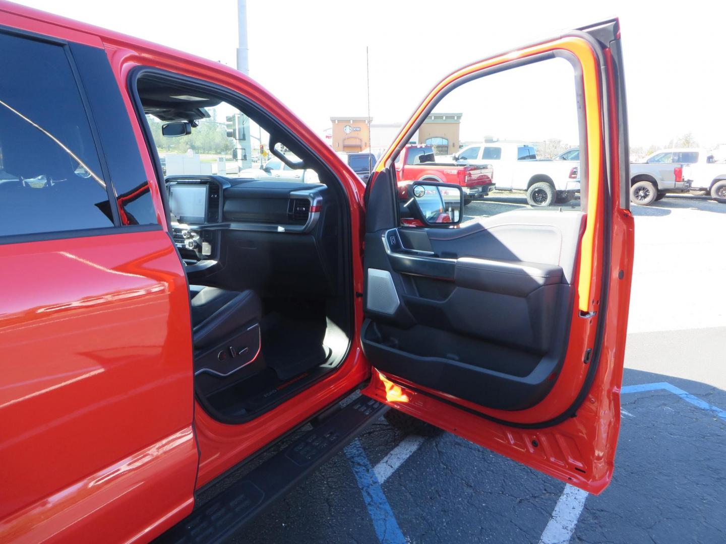 2023 Orange /Blue Ford F-150 Raptor 37 SuperCrew 4WD (1FTFW1RG4PF) with an 3.5 V6 engine, 6A transmission, located at 2630 Grass Valley Highway, Auburn, CA, 95603, (530) 508-5100, 38.937893, -121.095482 - Clean one owner Raptor 37 with Recaro Blue Accent seats, Pro Power Onboard 2K Generator, Power Tailgate, and Twin Panel Moonroof. - Photo#70