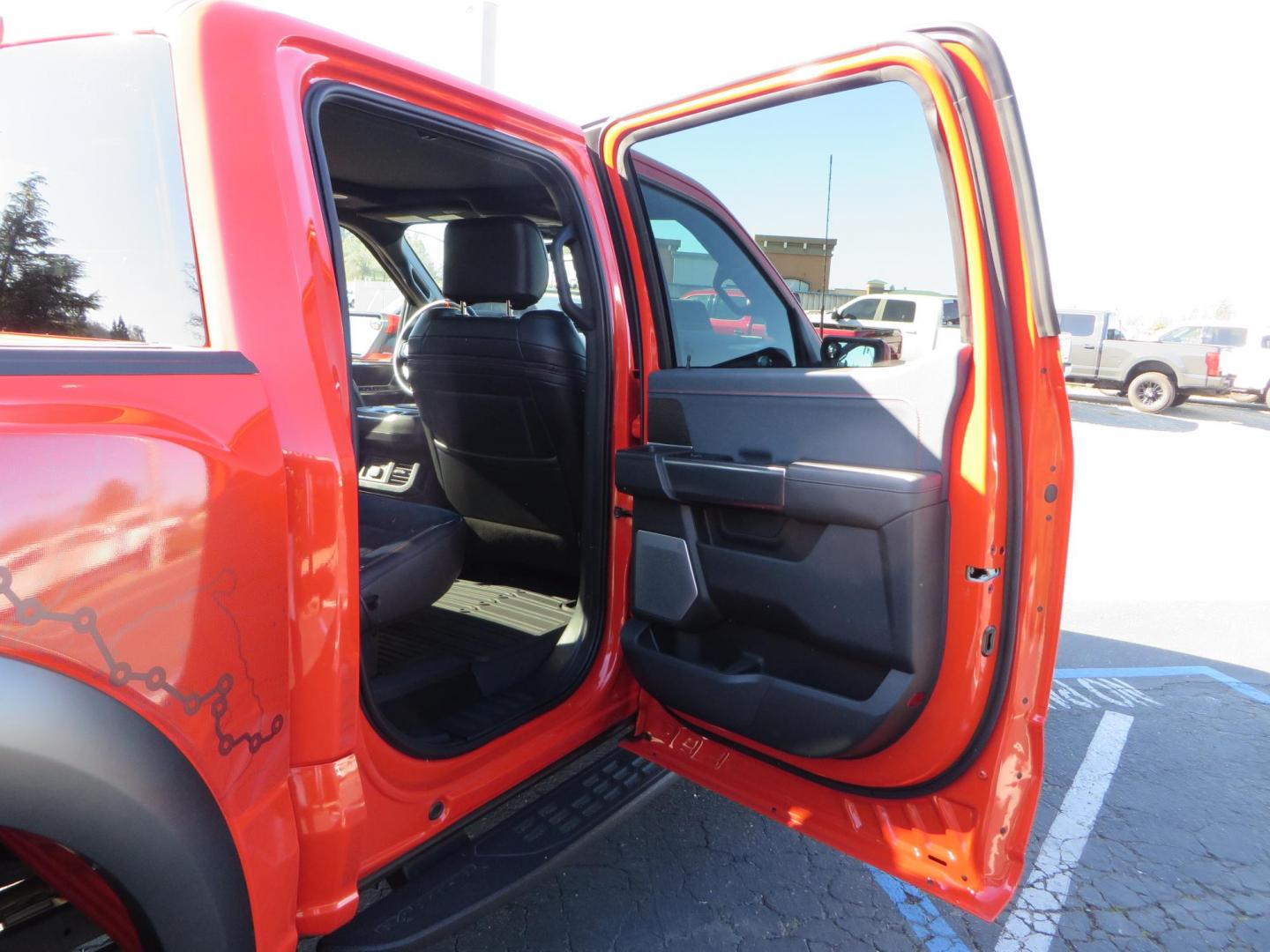 2023 Orange /Blue Ford F-150 Raptor 37 SuperCrew 4WD (1FTFW1RG4PF) with an 3.5 V6 engine, 6A transmission, located at 2630 Grass Valley Highway, Auburn, CA, 95603, (530) 508-5100, 38.937893, -121.095482 - Clean one owner Raptor 37 with Recaro Blue Accent seats, Pro Power Onboard 2K Generator, Power Tailgate, and Twin Panel Moonroof. - Photo#80