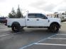 2019 White Ford F-250 SD XLT Crew Cab Short Bed 4WD (1FT7W2BT9KE) with an 6.7L V8 OHV 16V DIESEL engine, 6A transmission, located at 2630 Grass Valley Highway, Auburn, CA, 95603, (530) 508-5100, 38.937893, -121.095482 - Leveled XLT sitting on 22" SOTA Novakane wheels, 325 Nitto Ridge Grappler tires, Fox Shocks and dual steering stabilizers, Firestone Ride Rite air bags, Airlift wireless 1 air compressor, B&W Turnover gooseneck hitch, Weathertech floor liners, Deezee tailgate assist, and window tint. - Photo#3