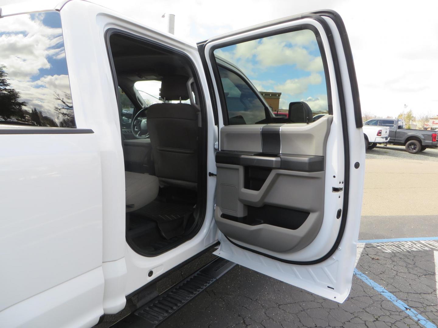 2019 White Ford F-250 SD XLT Crew Cab Short Bed 4WD (1FT7W2BT9KE) with an 6.7L V8 OHV 16V DIESEL engine, 6A transmission, located at 2630 Grass Valley Highway, Auburn, CA, 95603, (530) 508-5100, 38.937893, -121.095482 - Leveled XLT sitting on 22" SOTA Novakane wheels, 325 Nitto Ridge Grappler tires, Fox Shocks and dual steering stabilizers, Firestone Ride Rite air bags, Airlift wireless 1 air compressor, B&W Turnover gooseneck hitch, Weathertech floor liners, Deezee tailgate assist, and window tint. - Photo#56