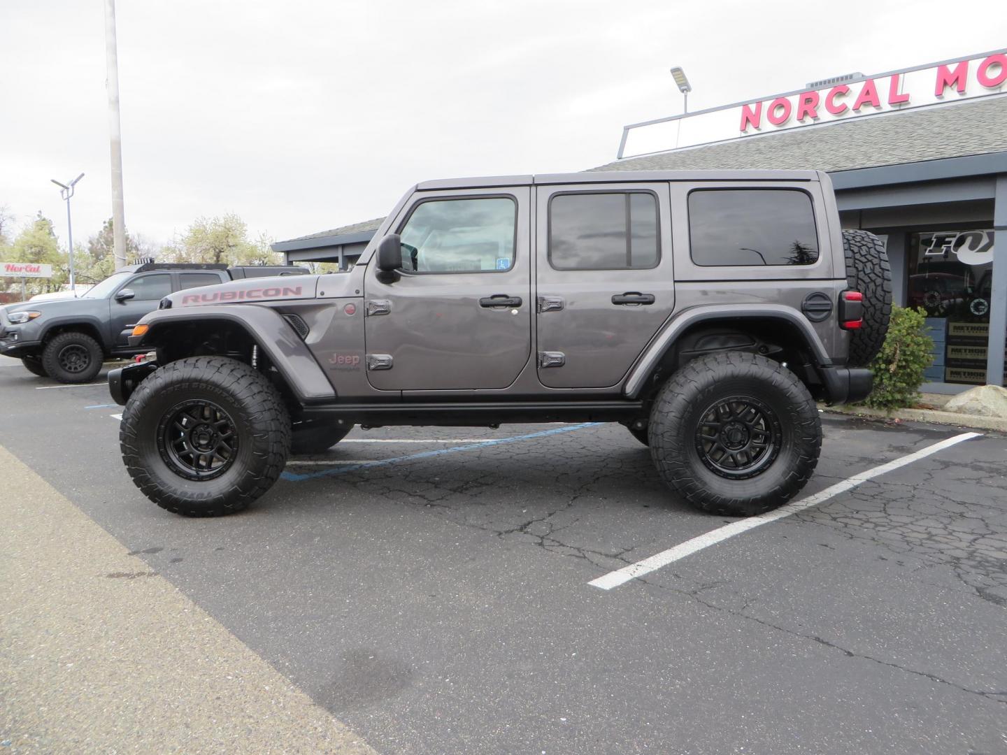 2021 CHARCOAL /black Jeep Wrangler Unlimited Rubicon (1C4HJXFG5MW) with an 3.6L V6 DOHC 24V FFV engine, 6A transmission, located at 2630 Grass Valley Highway, Auburn, CA, 95603, (530) 508-5100, 38.937893, -121.095482 - Photo#7