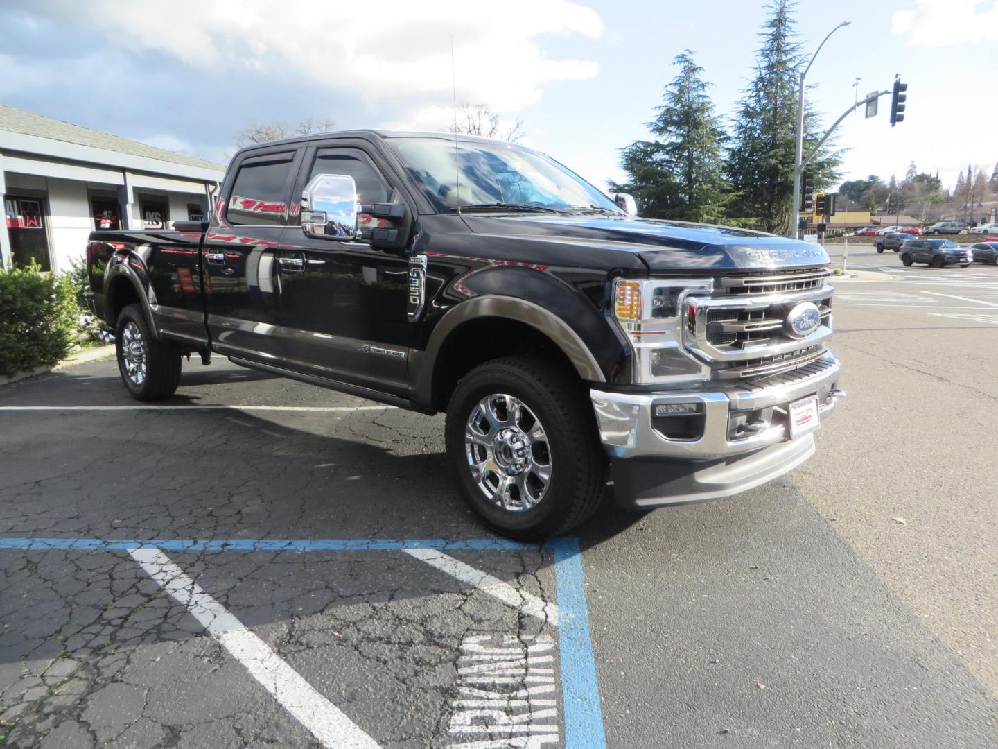 2020 BLACK /BROWN Ford F-350 SD King Ranch Crew Cab Long Bed 4WD (1FT8W3BT7LE) with an 6.7L V8 OHV 16V DIESEL engine, 6A transmission, located at 2630 Grass Valley Highway, Auburn, CA, 95603, (530) 508-5100, 38.937893, -121.095482 - Features a Decked Truck Bed storage system, Better Build toolbox, Bolt cable locks, Bug Defelector, and Weathertech side window deflectors. - Photo#2