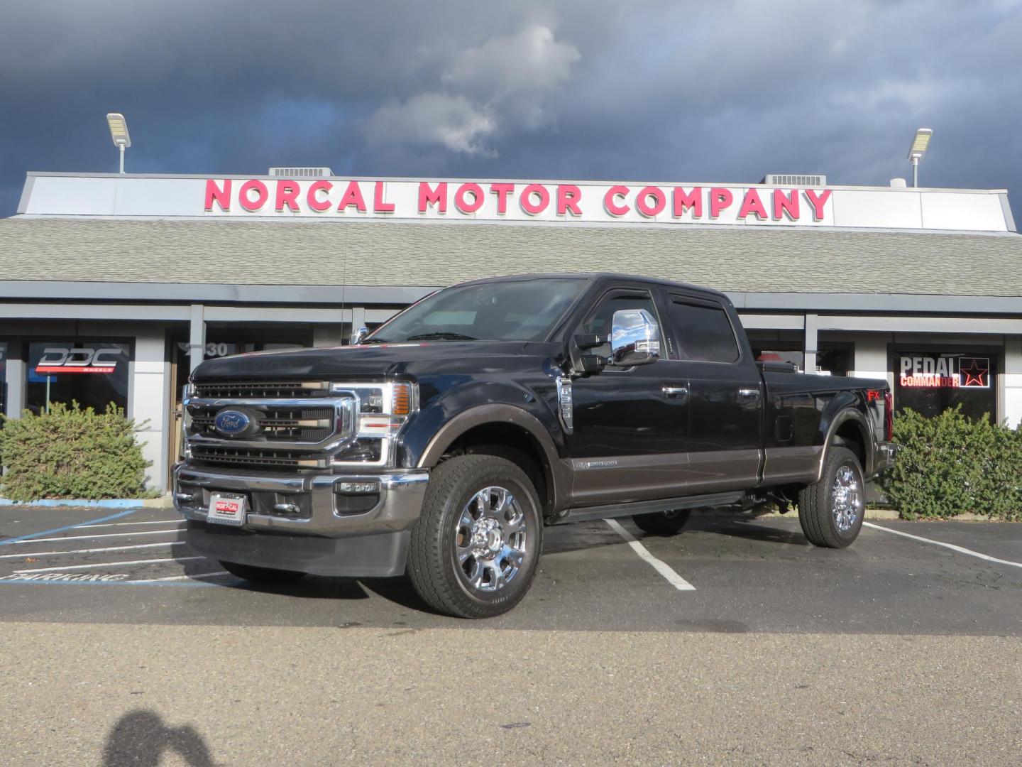 2020 BLACK /BROWN Ford F-350 SD King Ranch Crew Cab Long Bed 4WD (1FT8W3BT7LE) with an 6.7L V8 OHV 16V DIESEL engine, 6A transmission, located at 2630 Grass Valley Highway, Auburn, CA, 95603, (530) 508-5100, 38.937893, -121.095482 - Features a Decked Truck Bed storage system, Better Build toolbox, Bolt cable locks, Bug Defelector, and Weathertech side window deflectors. - Photo#0