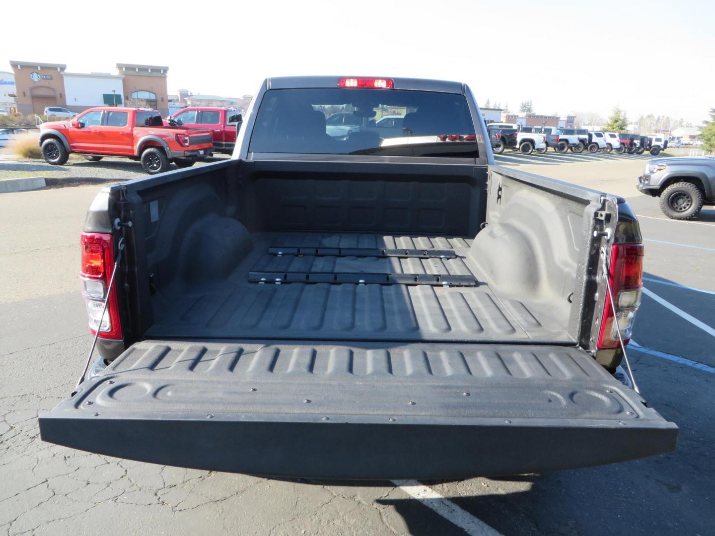 2024 CHARCOAL /BLACK RAM 2500 Big Horn Crew Cab SWB 4WD (3C6UR5DL7RG) with an 6.7L L6 OHV 24V TURBO DIESEL engine, 6A transmission, located at 2630 Grass Valley Highway, Auburn, CA, 95603, (530) 508-5100, 38.937893, -121.095482 - Leveled Ram sitting on 37" Toyo RT trail tires, 17" Method MR318 wheels, Fox 2.5 remote reservoir shock up front, Amp Power steps, and window tint. - Photo#17