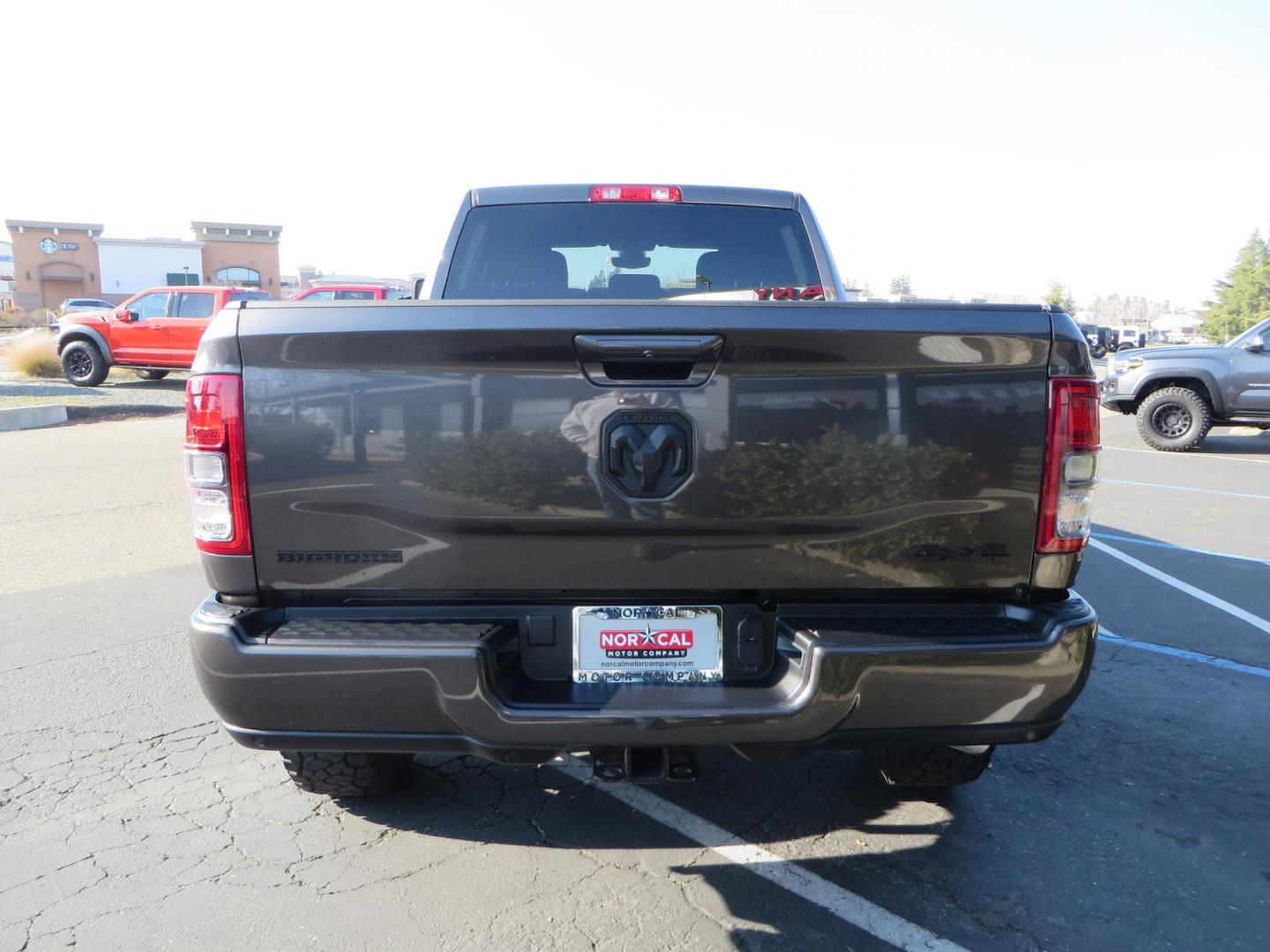 2024 CHARCOAL /BLACK RAM 2500 Big Horn Crew Cab SWB 4WD (3C6UR5DL7RG) with an 6.7L L6 OHV 24V TURBO DIESEL engine, 6A transmission, located at 2630 Grass Valley Highway, Auburn, CA, 95603, (530) 508-5100, 38.937893, -121.095482 - Leveled Ram sitting on 37" Toyo RT trail tires, 17" Method MR318 wheels, Fox 2.5 remote reservoir shock up front, Amp Power steps, and window tint. - Photo#5