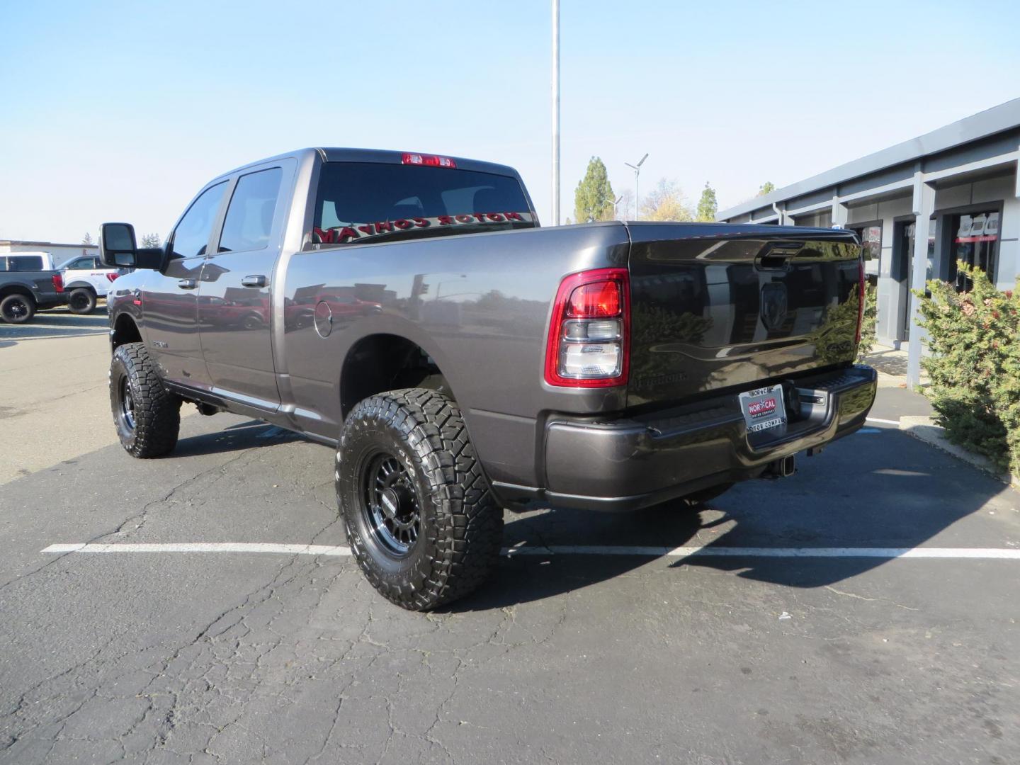 2024 CHARCOAL /BLACK RAM 2500 Big Horn Crew Cab SWB 4WD (3C6UR5DL7RG) with an 6.7L L6 OHV 24V TURBO DIESEL engine, 6A transmission, located at 2630 Grass Valley Highway, Auburn, CA, 95603, (530) 508-5100, 38.937893, -121.095482 - Leveled Ram sitting on 37" Toyo RT trail tires, 17" Method MR318 wheels, Fox 2.5 remote reservoir shock up front, Amp Power steps, and window tint. - Photo#6