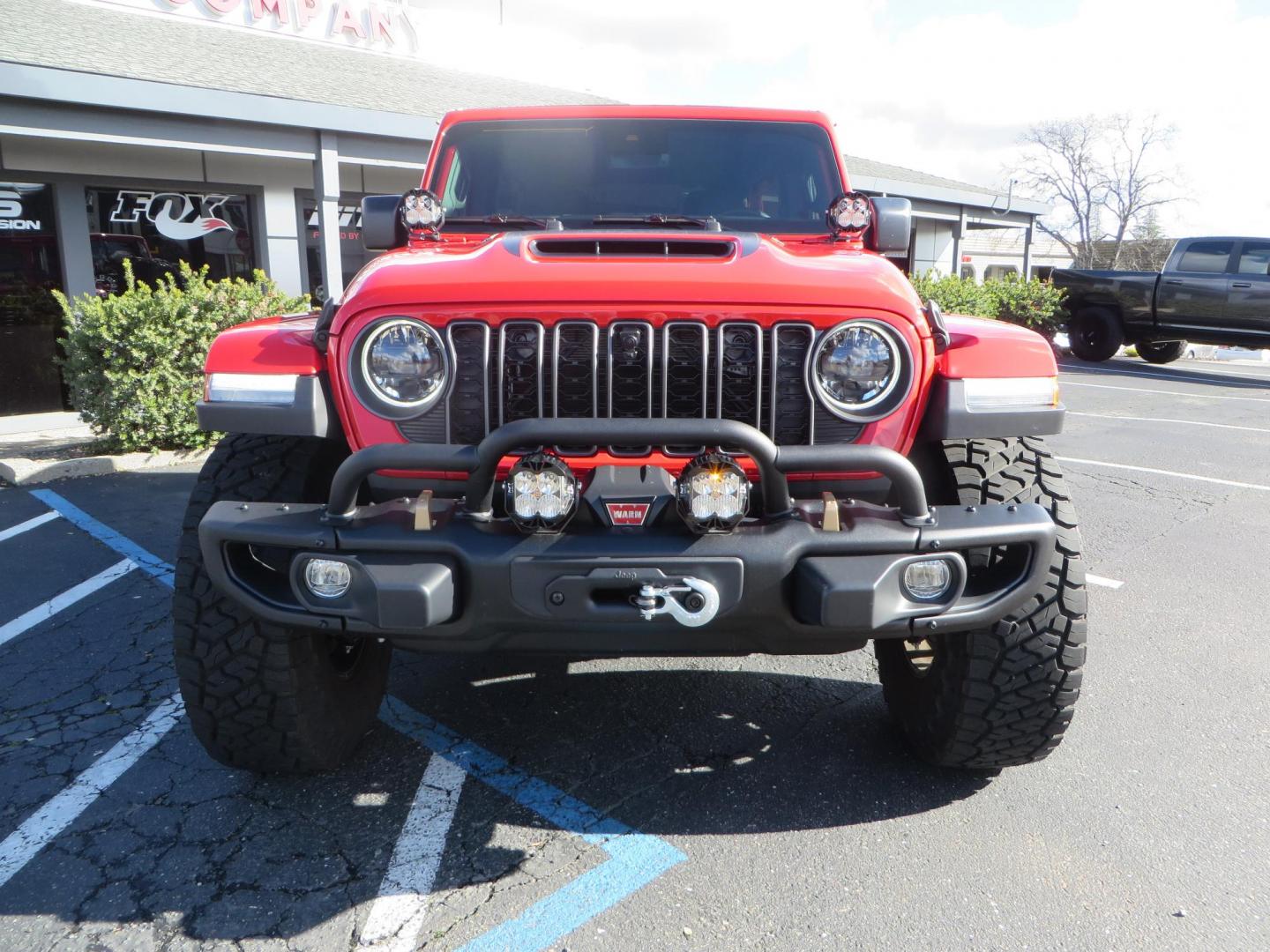 2024 Red /Black Jeep Wrangler Rubicon 392 (1C4RJXSJ3RW) with an 6.4L V8 DOHC 32V engine, 6M transmission, located at 2630 Grass Valley Highway, Auburn, CA, 95603, (530) 508-5100, 38.937893, -121.095482 - Final Edition Rubicon 392 with every option... Sitting on 17" Bronze Fuel Rebel wheels, 37" Toyo RT Trail tires, Baja Designs LP4 A pillar and bumper lights, paint correction before fully ceramic coated, PPF, and Ceramic window tint on front door glass and windshield. Sky One Touch Power top, Remova - Photo#1