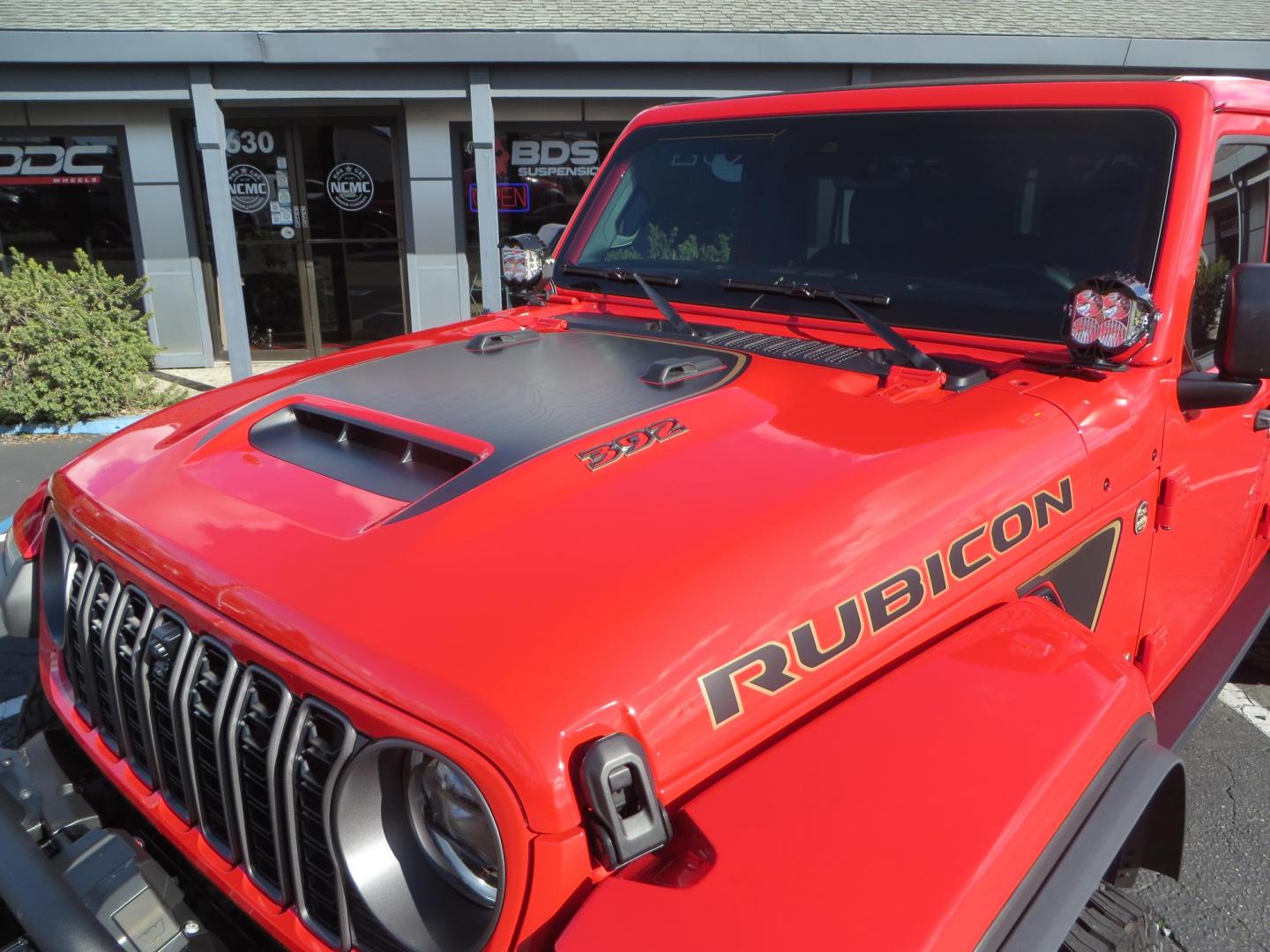 2024 Red /Black Jeep Wrangler Rubicon 392 (1C4RJXSJ3RW) with an 6.4L V8 DOHC 32V engine, 6M transmission, located at 2630 Grass Valley Highway, Auburn, CA, 95603, (530) 508-5100, 38.937893, -121.095482 - Final Edition Rubicon 392 with every option... Sitting on 17" Bronze Fuel Rebel wheels, 37" Toyo RT Trail tires, Baja Designs LP4 A pillar and bumper lights, paint correction before fully ceramic coated, PPF, and Ceramic window tint on front door glass and windshield. Sky One Touch Power top, Remova - Photo#14