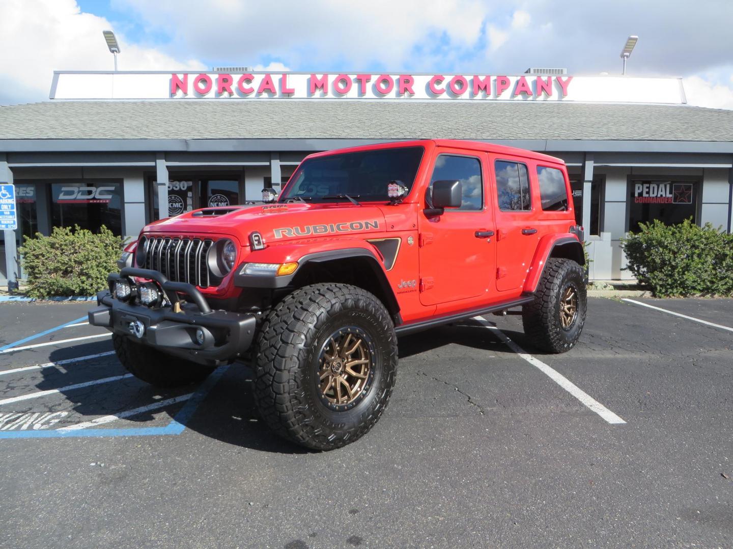 2024 Red /Black Jeep Wrangler Rubicon 392 (1C4RJXSJ3RW) with an 6.4L V8 DOHC 32V engine, 6M transmission, located at 2630 Grass Valley Highway, Auburn, CA, 95603, (530) 508-5100, 38.937893, -121.095482 - Final Edition Rubicon 392 with every option... Sitting on 17" Bronze Fuel Rebel wheels, 37" Toyo RT Trail tires, Baja Designs LP4 A pillar and bumper lights, paint correction before fully ceramic coated, PPF, and Ceramic window tint on front door glass and windshield. Sky One Touch Power top, Remova - Photo#0