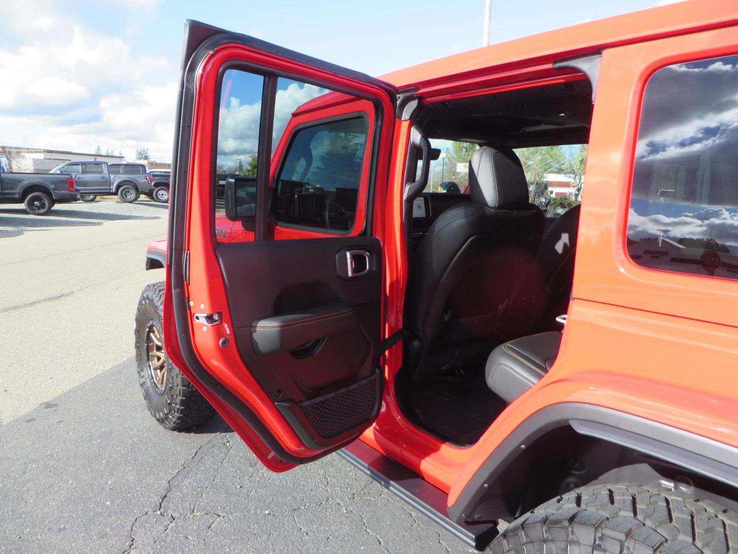 2024 Red /Black Jeep Wrangler Rubicon 392 (1C4RJXSJ3RW) with an 6.4L V8 DOHC 32V engine, 6M transmission, located at 2630 Grass Valley Highway, Auburn, CA, 95603, (530) 508-5100, 38.937893, -121.095482 - Final Edition Rubicon 392 with every option... Sitting on 17" Bronze Fuel Rebel wheels, 37" Toyo RT Trail tires, Baja Designs LP4 A pillar and bumper lights, paint correction before fully ceramic coated, PPF, and Ceramic window tint on front door glass and windshield. Sky One Touch Power top, Remova - Photo#51