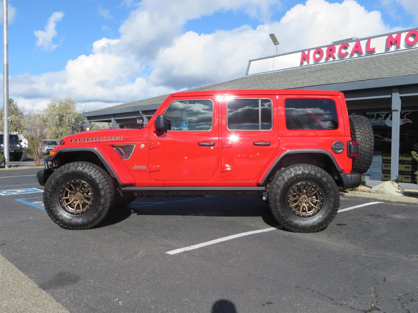 2024 Red /Black Jeep Wrangler Rubicon 392 (1C4RJXSJ3RW) with an 6.4L V8 DOHC 32V engine, 6M transmission, located at 2630 Grass Valley Highway, Auburn, CA, 95603, (530) 508-5100, 38.937893, -121.095482 - Final Edition Rubicon 392 with every option... Sitting on 17" Bronze Fuel Rebel wheels, 37" Toyo RT Trail tires, Baja Designs LP4 A pillar and bumper lights, paint correction before fully ceramic coated, PPF, and Ceramic window tint on front door glass and windshield. Sky One Touch Power top, Remova - Photo#7